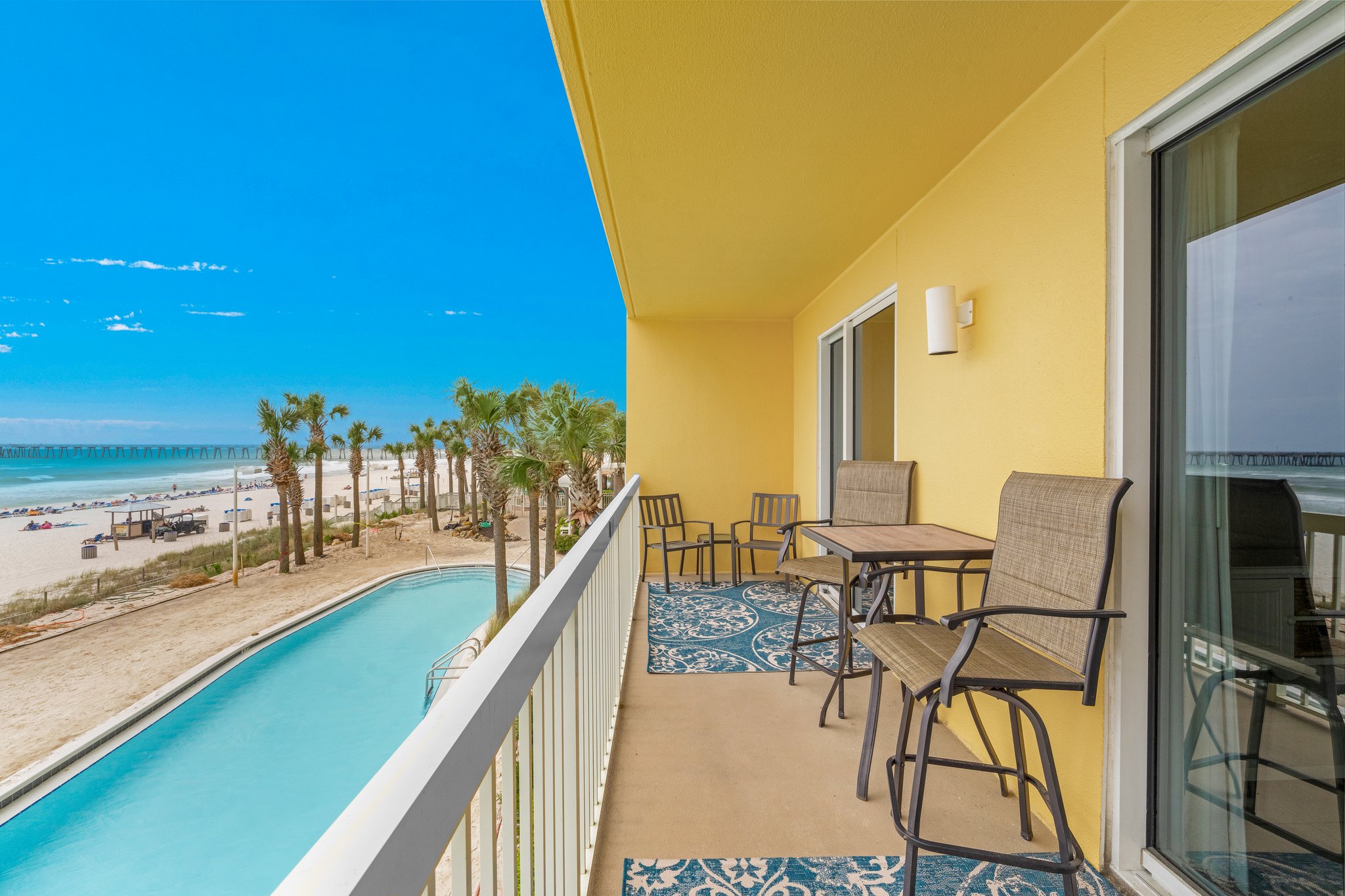 Balcony with hightop table and chairs