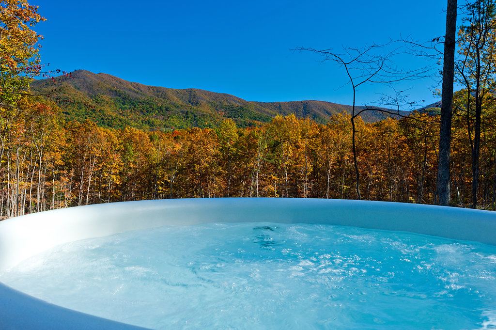 Unwind in the hot tub while soaking in breathtaking mountain views and complete tranquility.