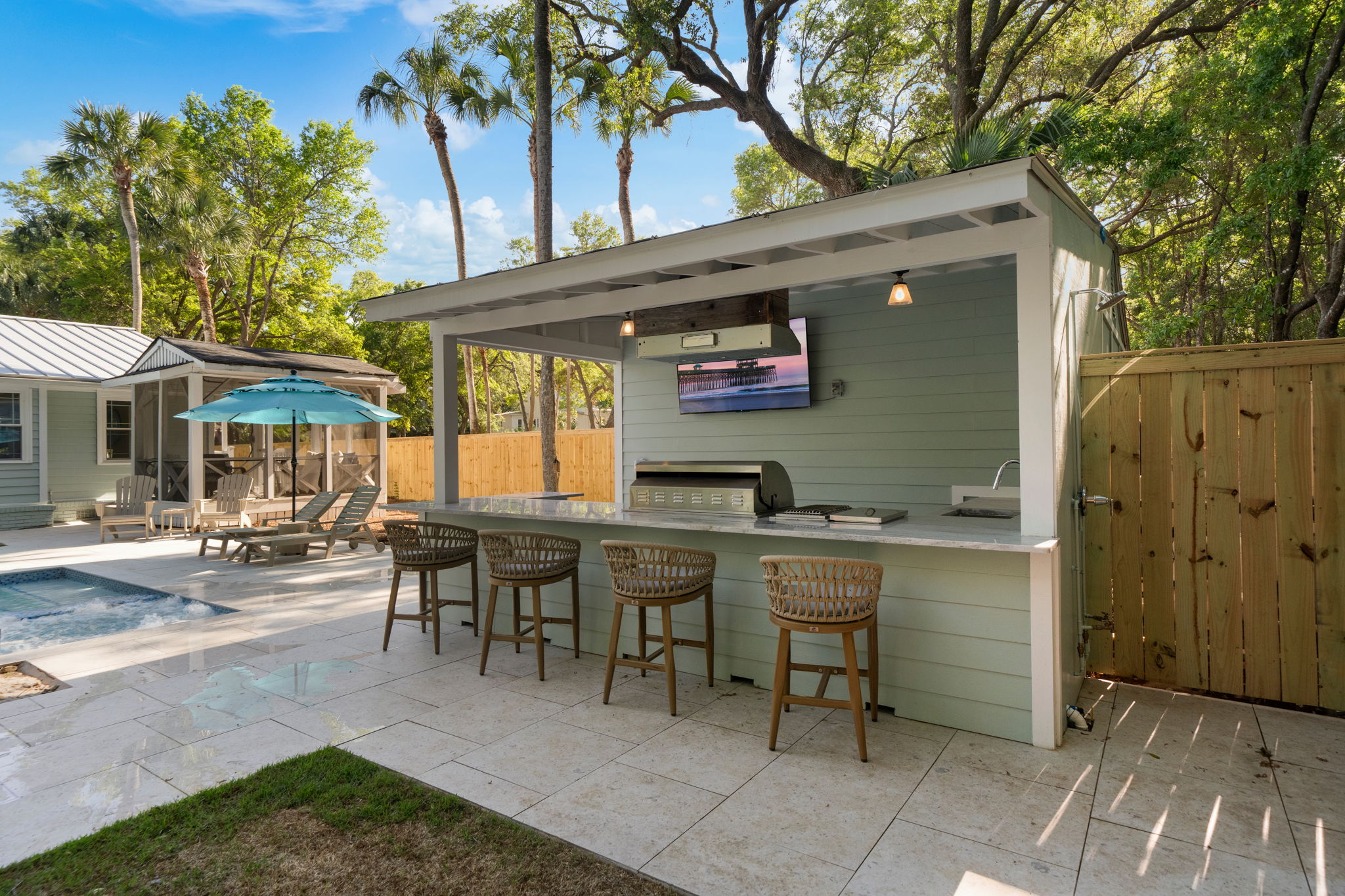 Outdoor Kitchen And Bar With Gourmet Grill, Beer and Wine Fridge, Ice Maker, and 65" Smart TV | IOP Escapes Beach Blessing | 3705 Hartnett Blvd, Isle of Palms, SC