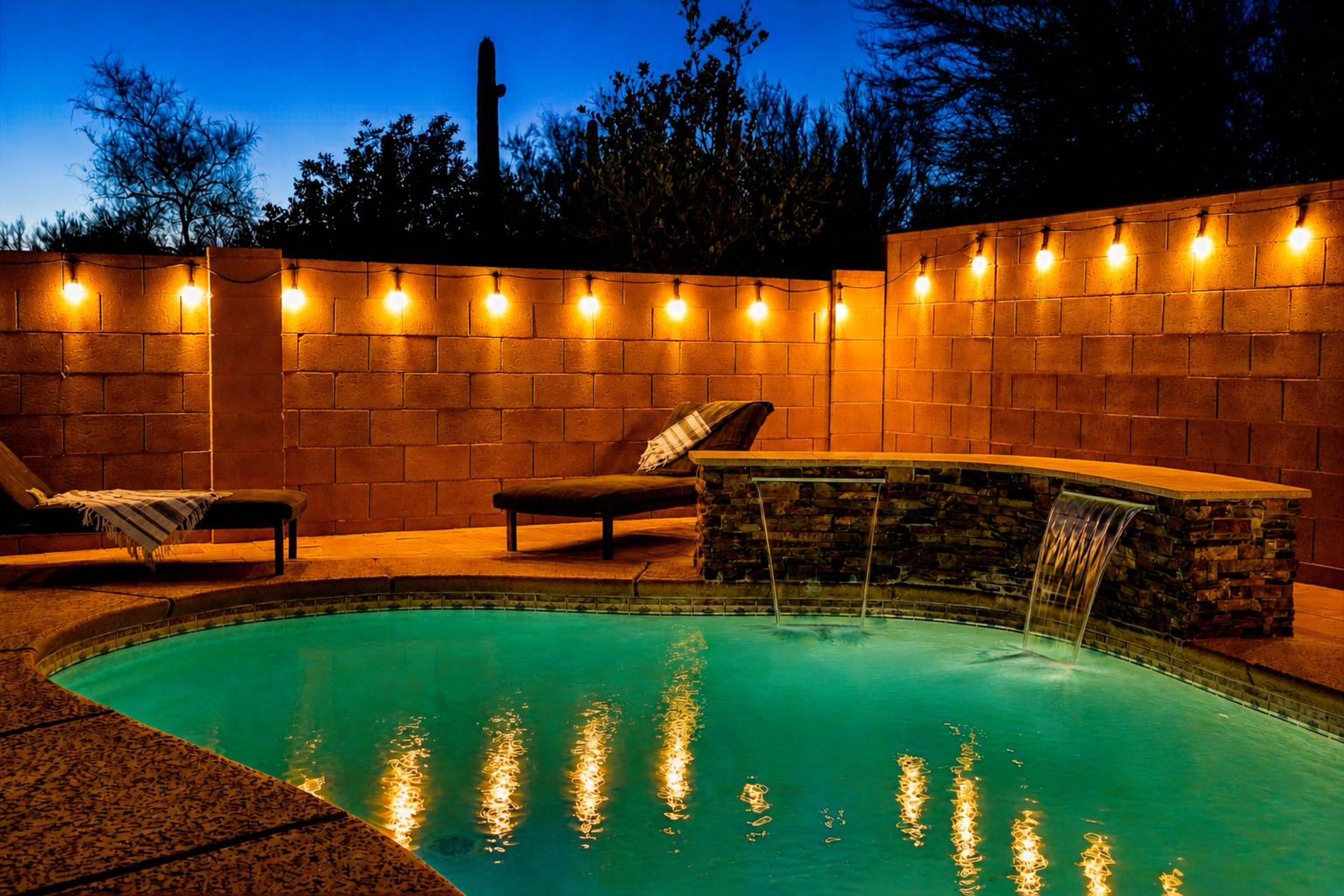 The heated pool can be enjoyed day or night year round.