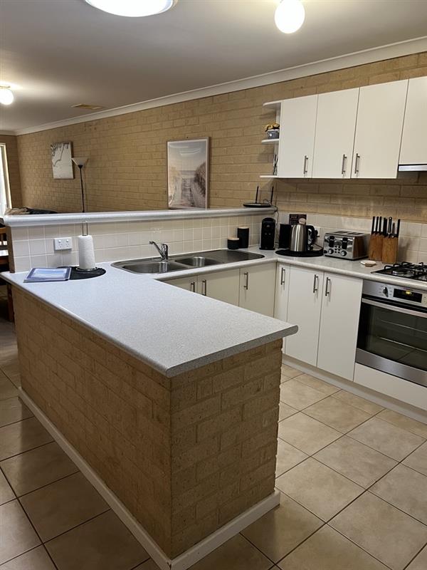 Lovely modern kitchen with coffee pod machine & underbench microwave