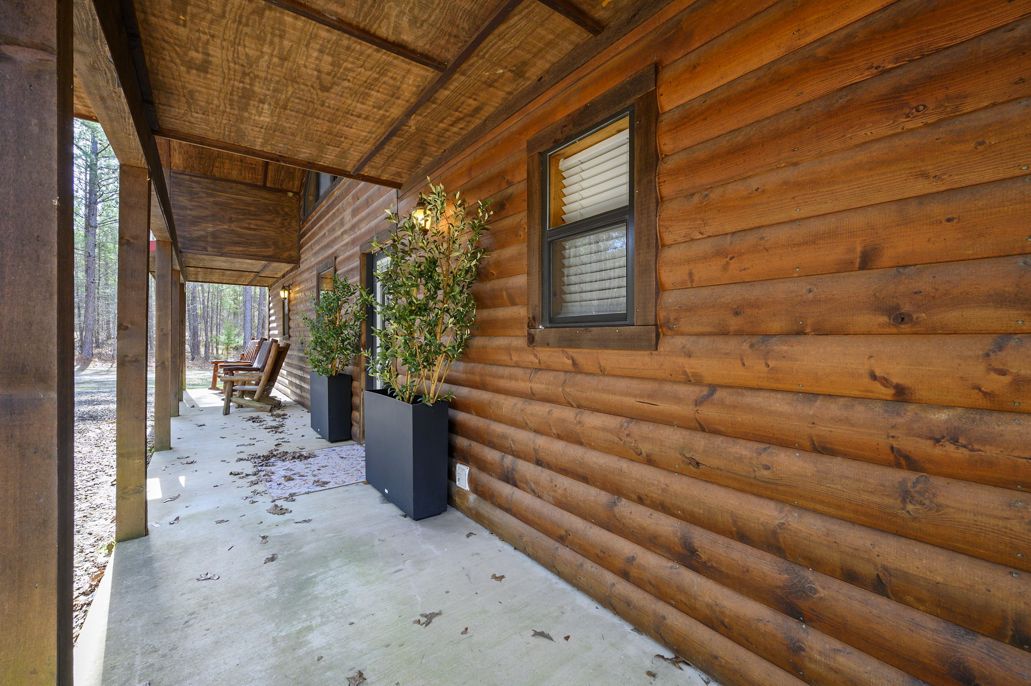 Classic cabin architecture surrounded by nature; a refined mountain escape designed for comfort from the moment you arrive.