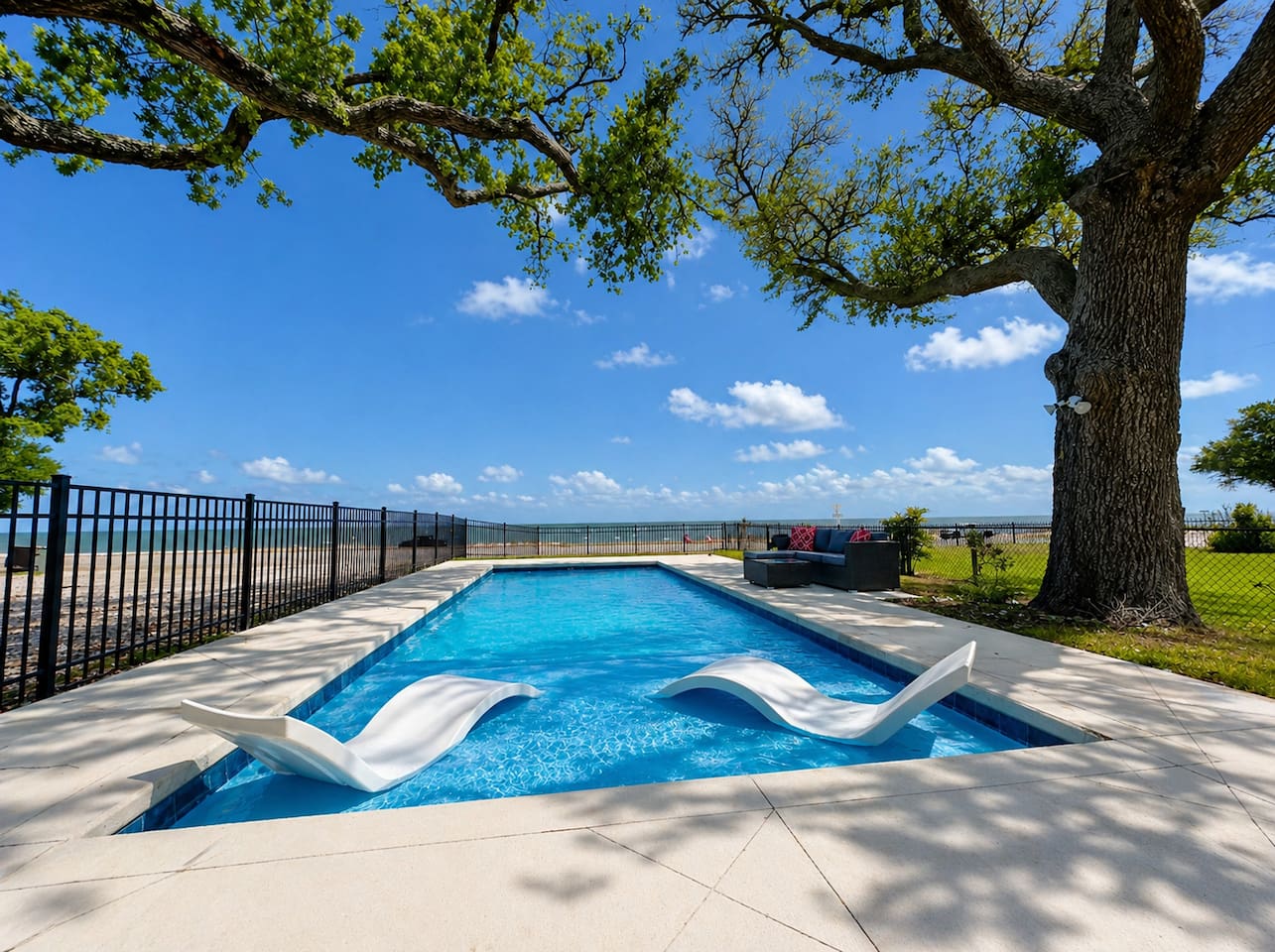 Enjoy sunny swims with the beach just steps away.
