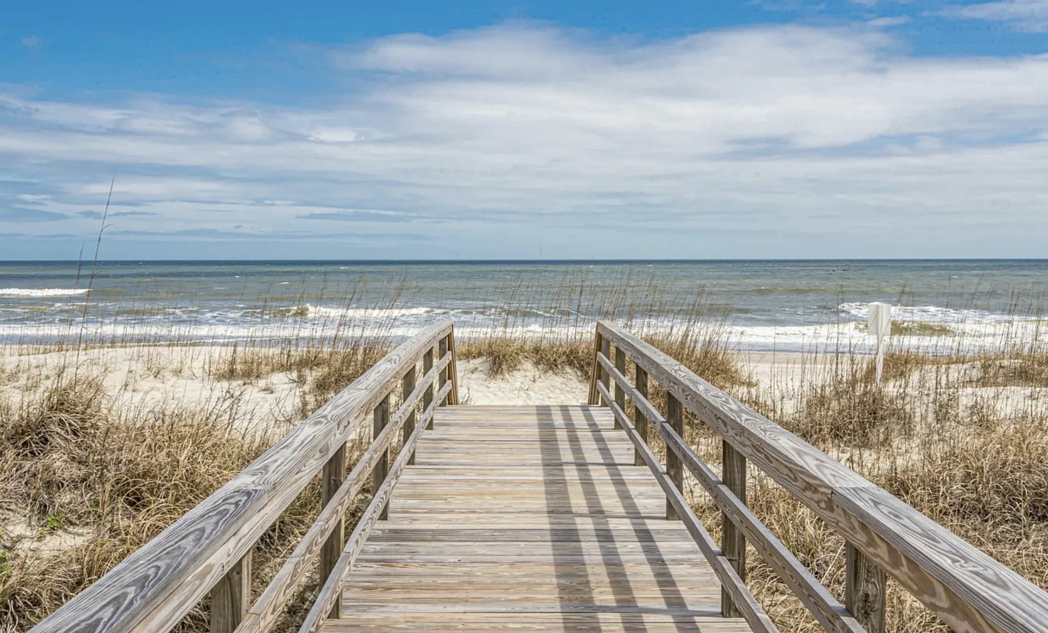 The boardwalk to the beach is just a short walk, no driving or parking needed. ⭐
