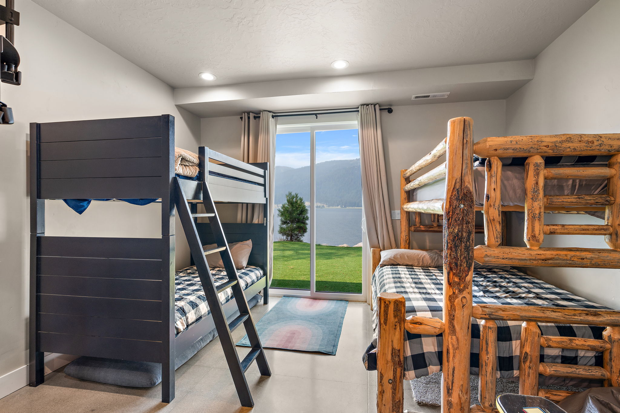 Stylish and cozy bunk beds with stunning waterfront scenery.