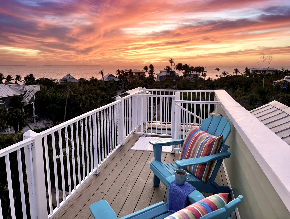 On the crow's nest rooftop deck enjoy panoramic views of the Gulf of America, Pine Island Sound, and the colorful homes of NCI - Sunsets here are the kind people grab their cameras for.