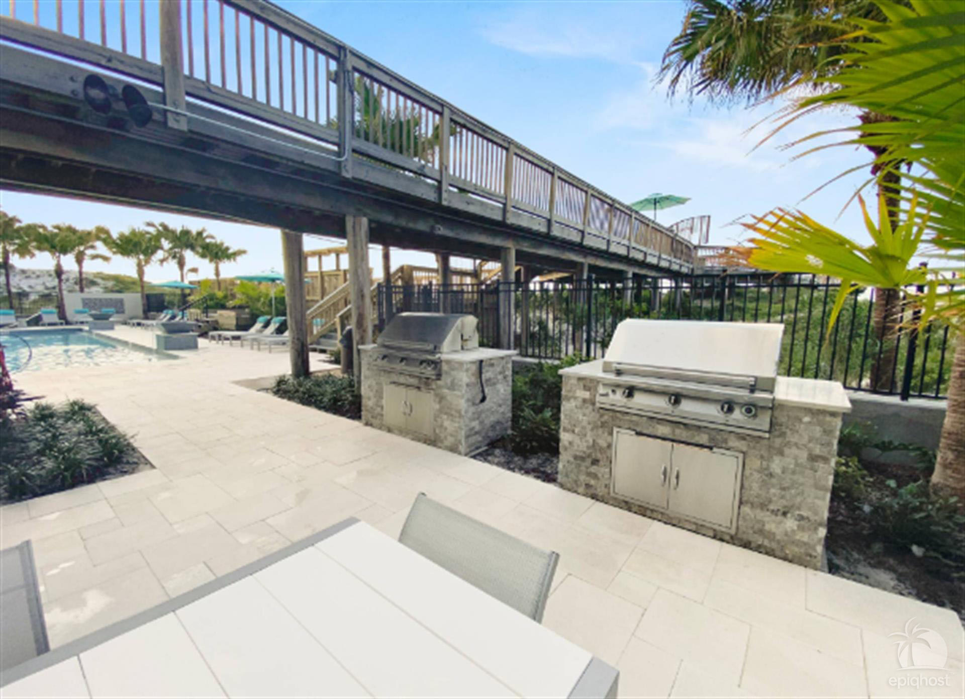 Covered outdoor dining and grilling area