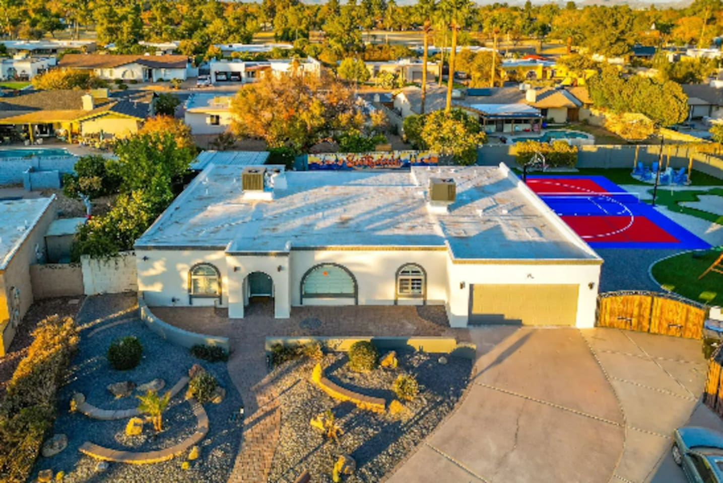 A classic Southwest facade with desert landscaping out front — a quiet first impression before the backyard steals the show.