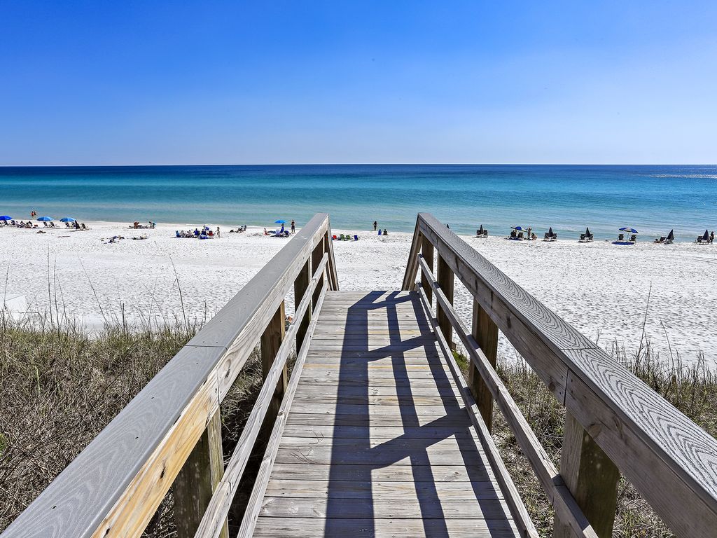 Boardwalk to the beach.. only steps away from this villa