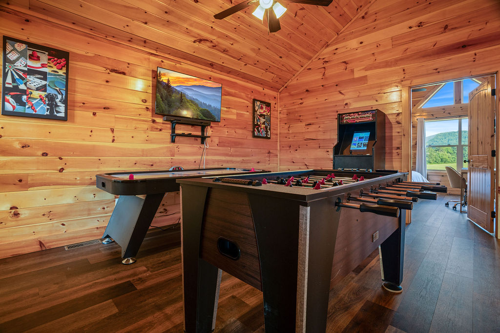 Foosball, air hockey and Multicade Arcade featuring Pac-Mac, Galaga, and Donkey Kong to name a few.