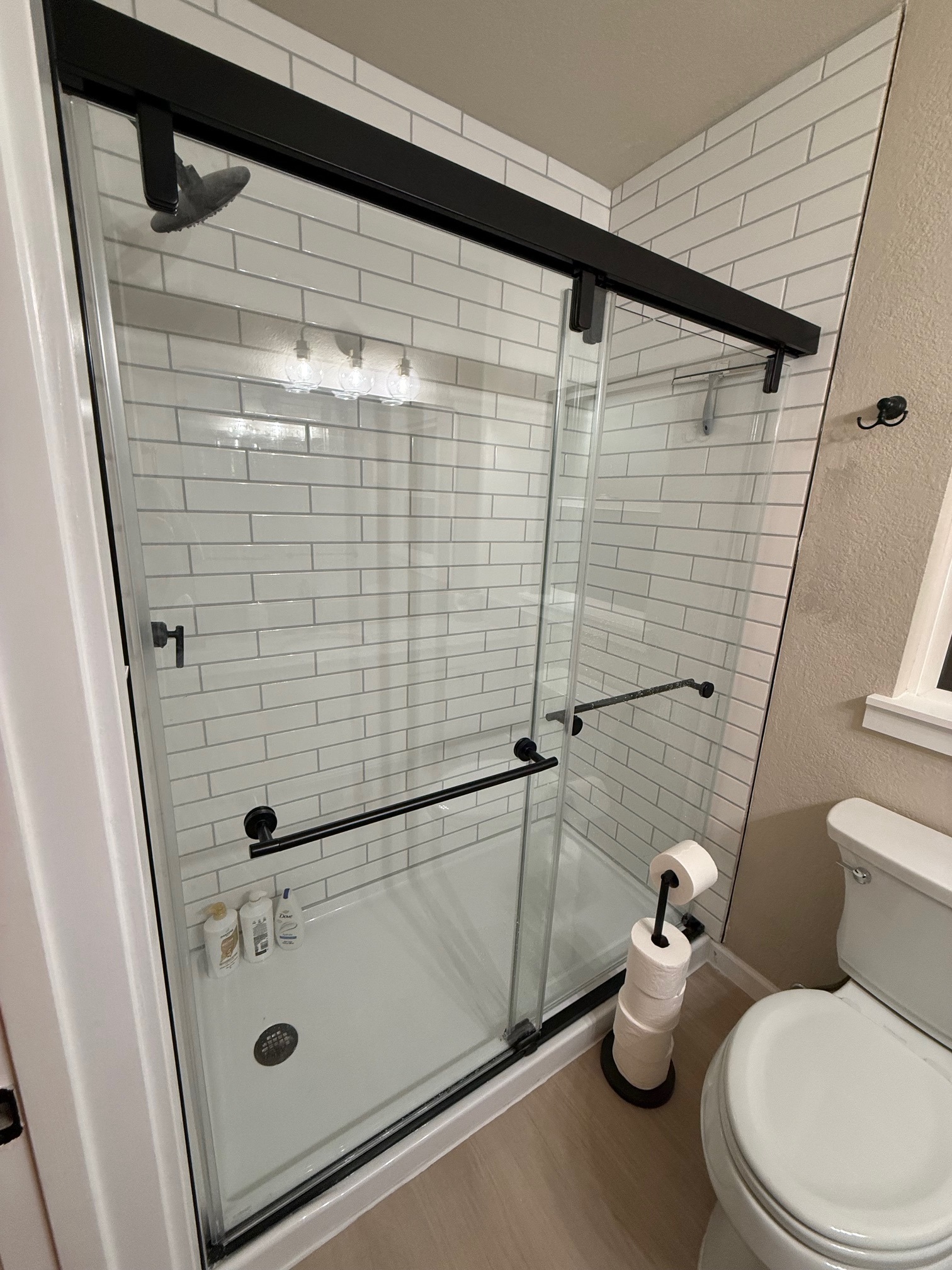 Newly remodeled bathroom with sliding glass door