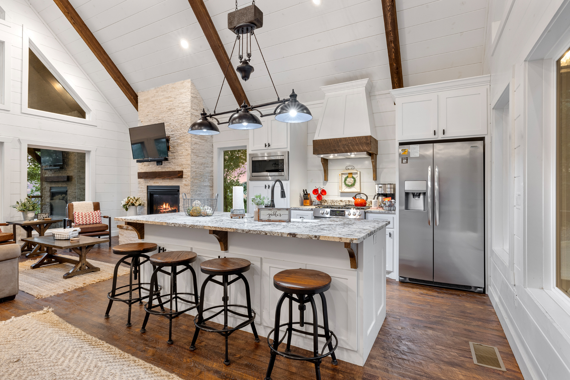 Bright gourmet kitchen with spacious island and modern farmhouse style