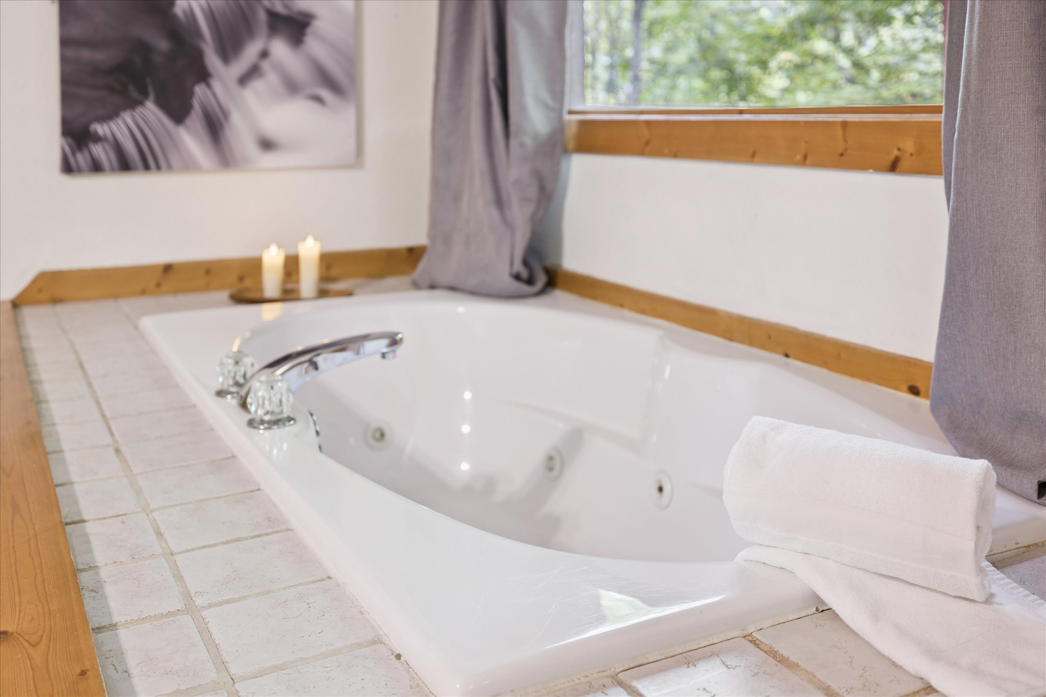 Jetted Jacuzzi tub in master bedroom