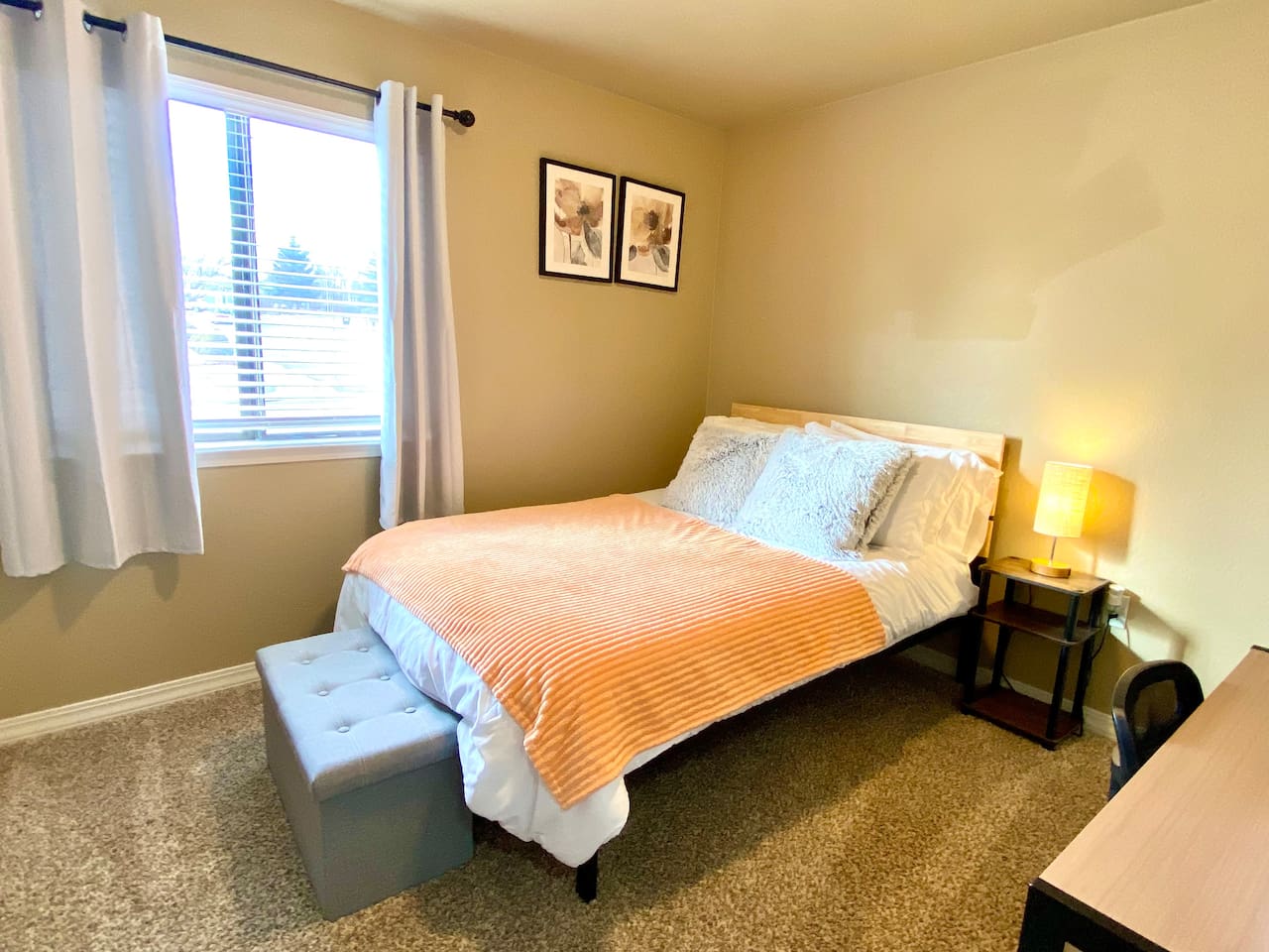 Bedroom with double bed and desk