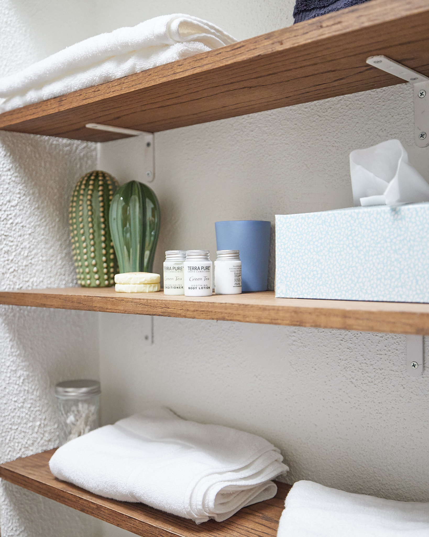 Body lotion, Q-tips, and cotton pads provided