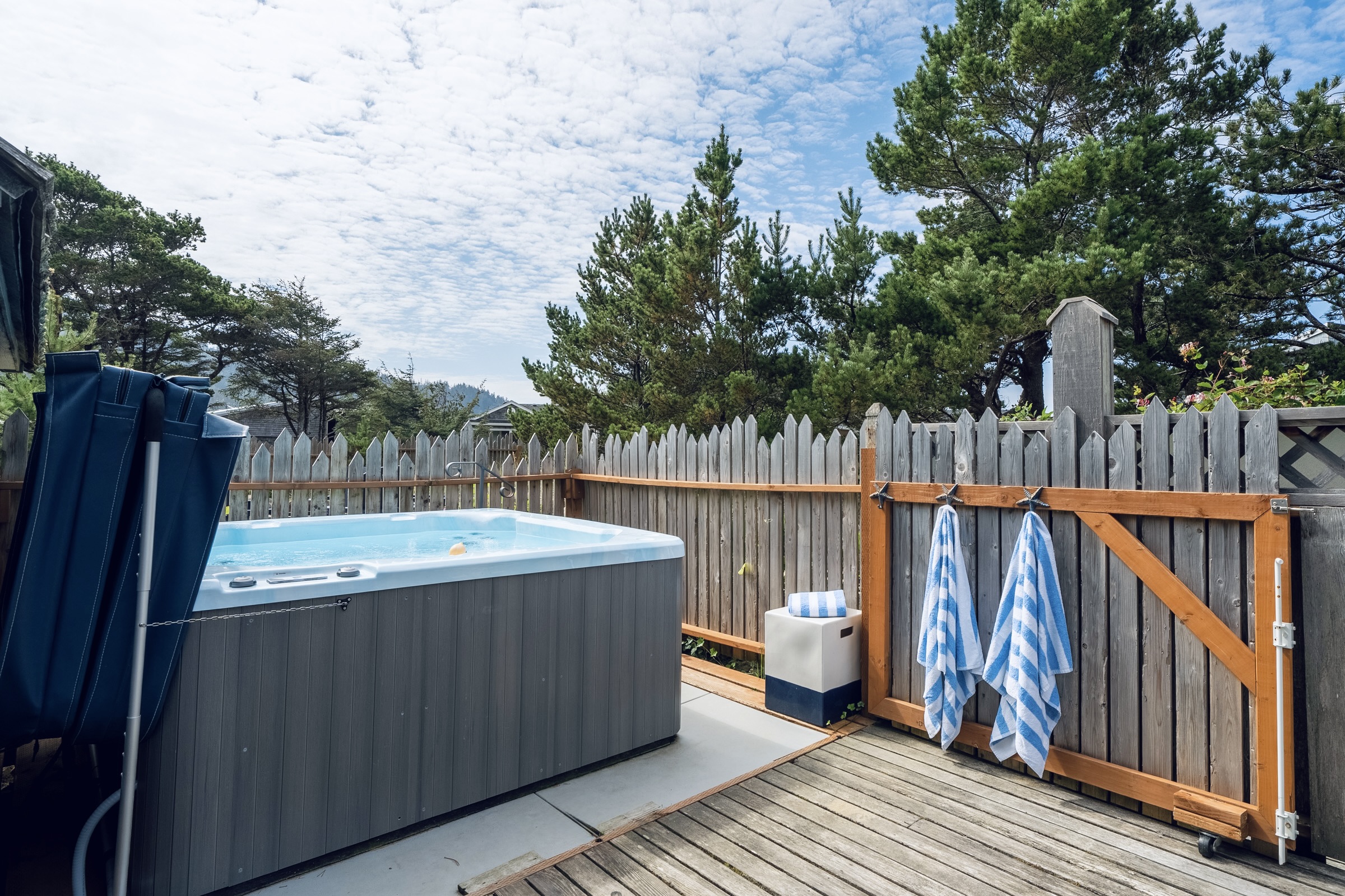 HOT TUB  seats six & tucked away behind a set of double gates