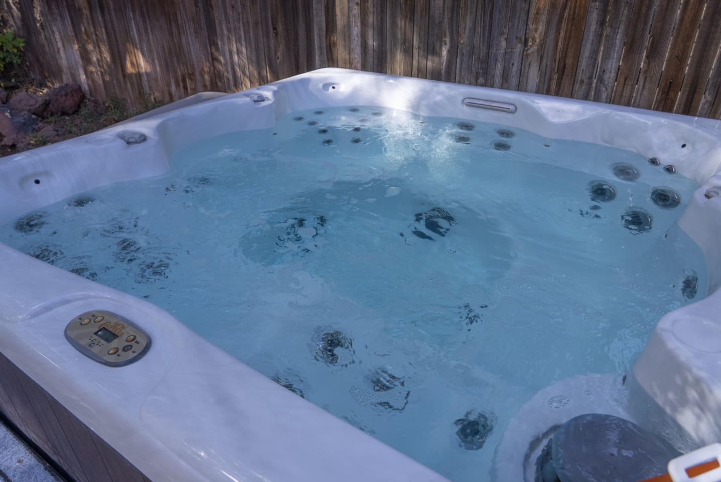 Relax in the outdoor hot tub after exploring, hiking, or spending the day around town.