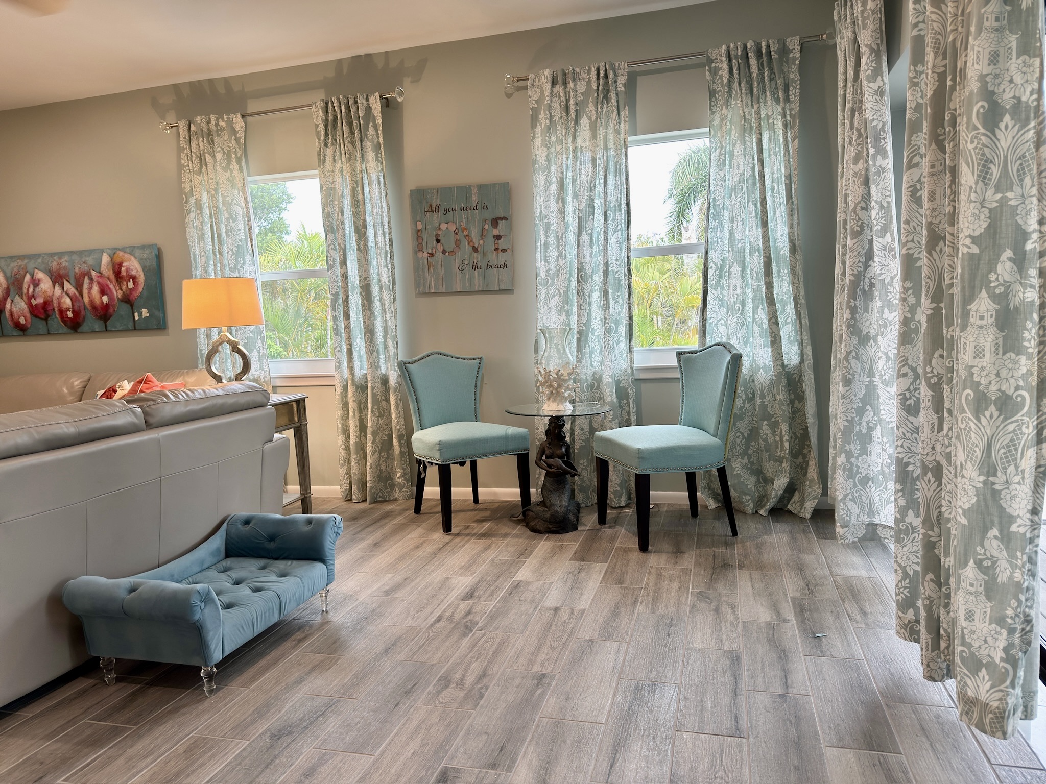 Both living room and dining room have access to the screened in lanai.