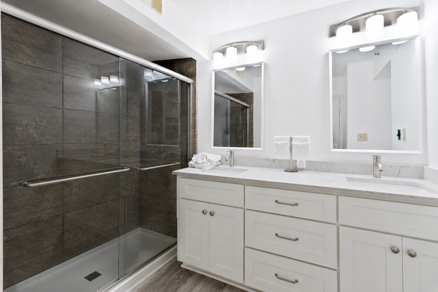 The Ensuite Bathroom, recently renovated with sliding glass walk in shower, connected to Primary Bedroom