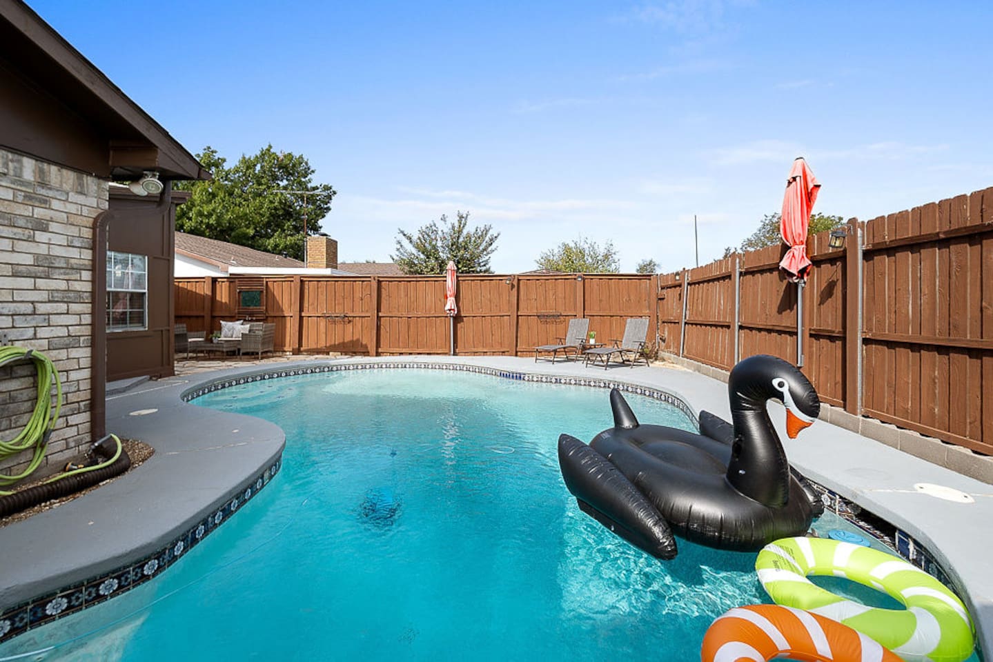 Take a dip in the refreshing pool in your private, fully-fenced backyard