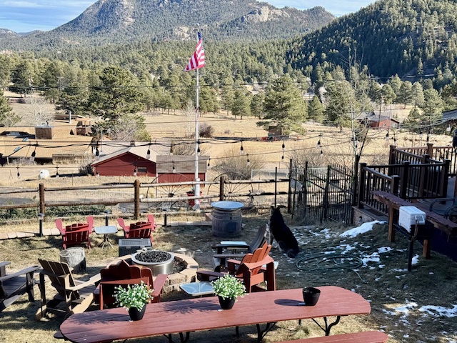Evenings by the fire with mountain views - Freddie’s favorite spot to watch the wildlife wander through the valley!