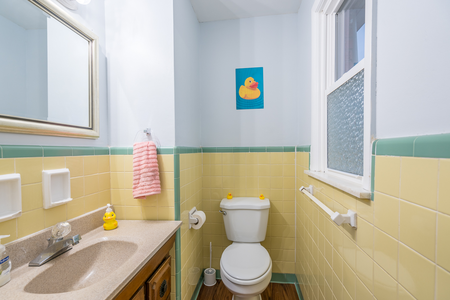 Main Floor Half Bath in the original retro yellow :)