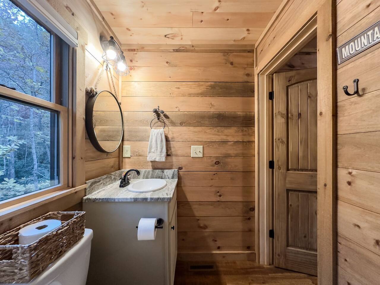 Our bathroom sink and mirror offer a pristine sanctuary where cleanliness meets serenity. Bask in the peaceful ambiance as you prepare for the day ahead or unwind in the evening glow