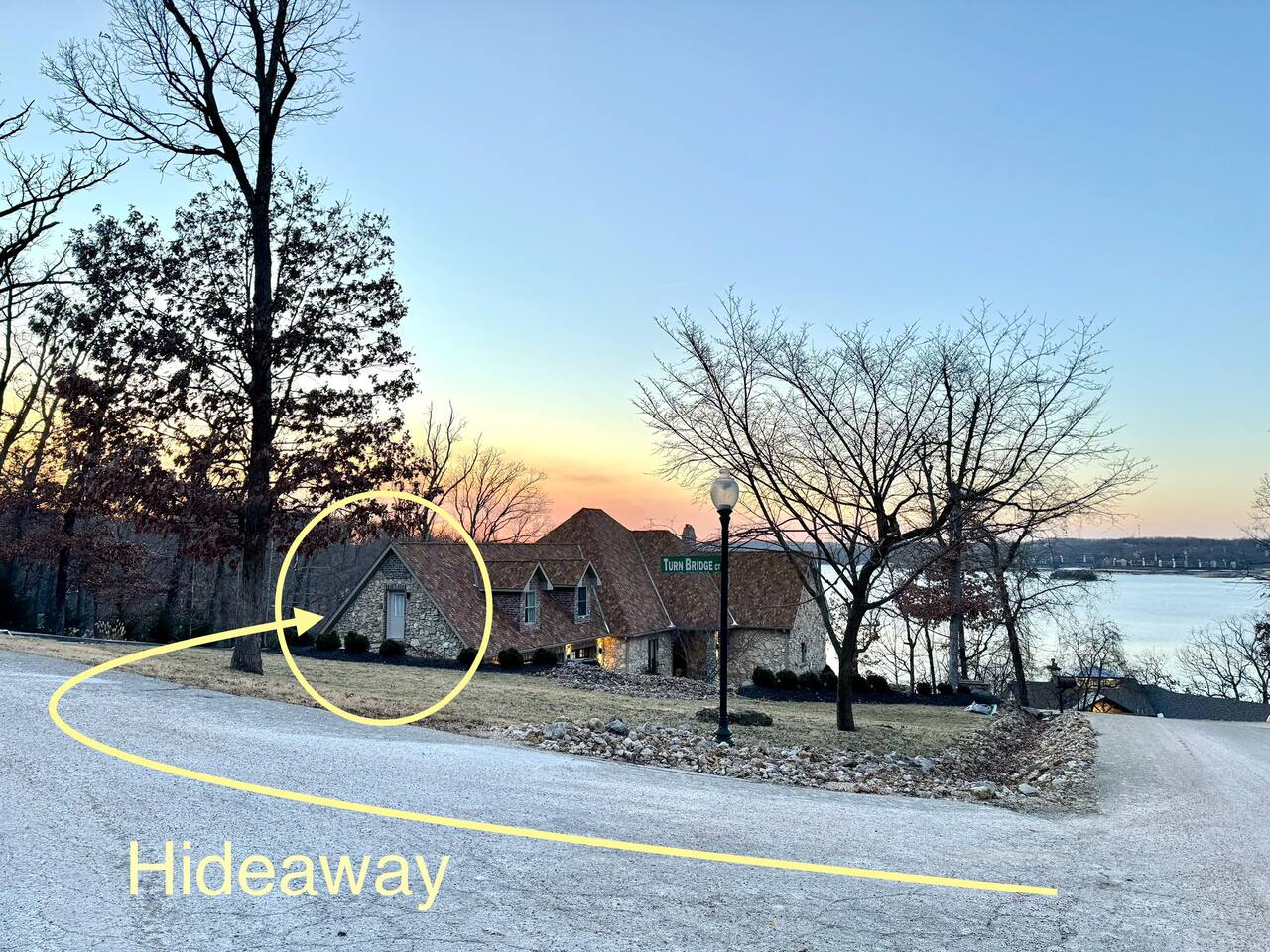 The house is located on a corner lot. The Hideaway is accessible from the side street before getting to the house. 
