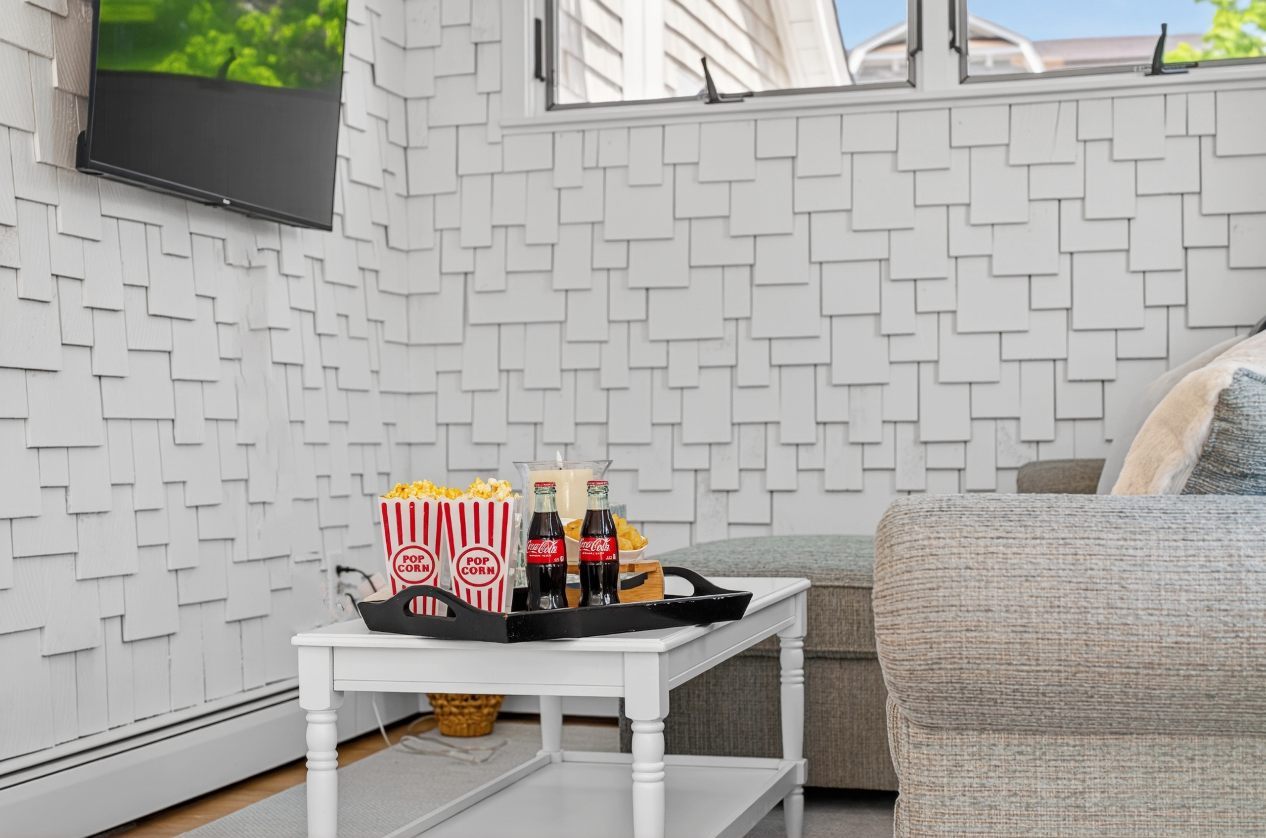 A relaxed setup ideal for sharing snacks, refreshments, and wine while enjoying a comfortable and social atmosphere.