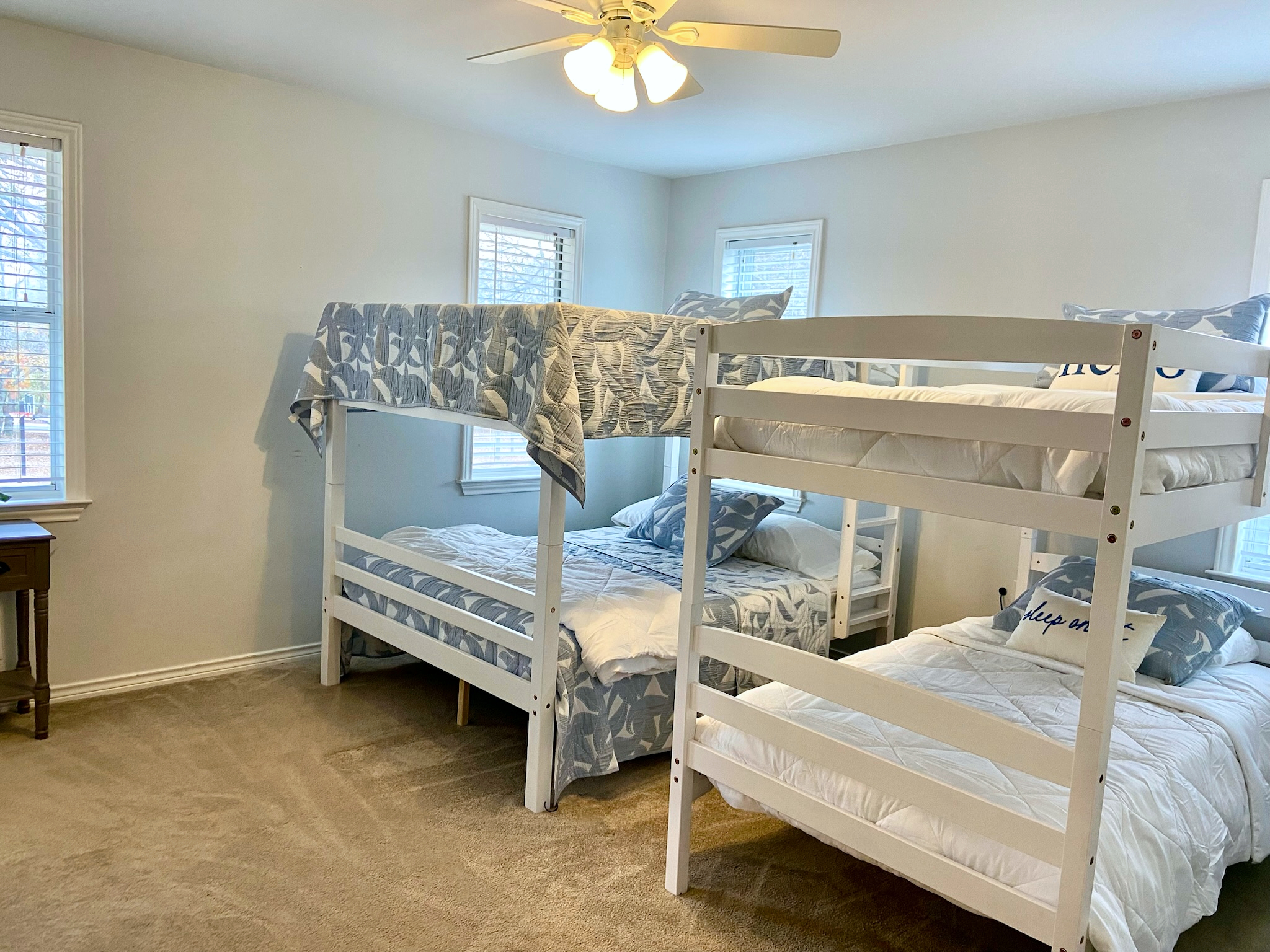 Farmhouse bedroom 4 - full-over-full and twin-over-twin bunkbeds and a cot