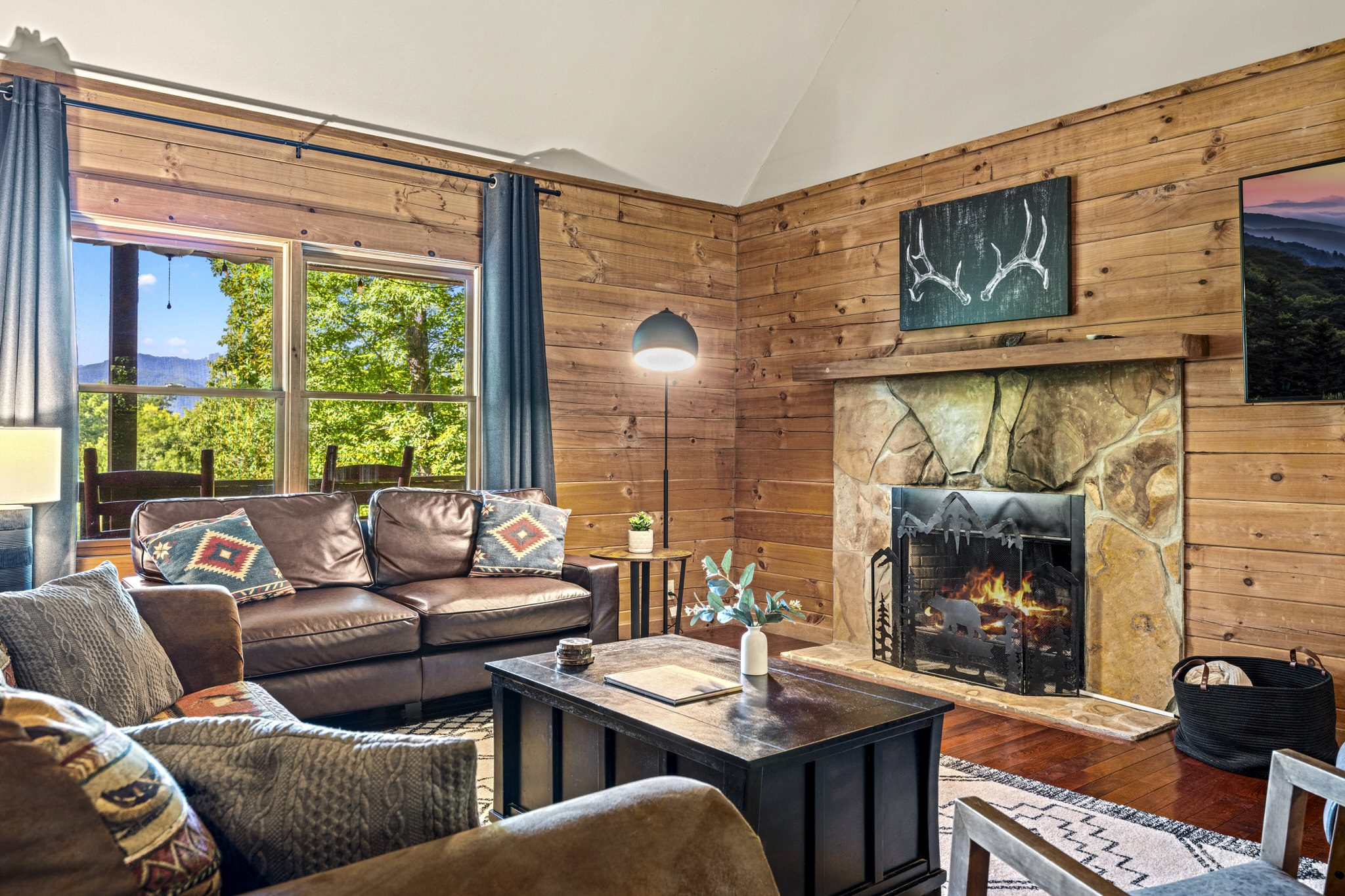 Gather with loved ones in this bright and welcoming living space, featuring ample seating for everyone and stunning mountain views just beyond the windows!