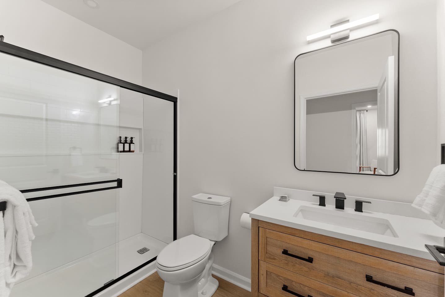 Another full bathroom conveniently located next to its twin—perfect for families or groups needing easy access.