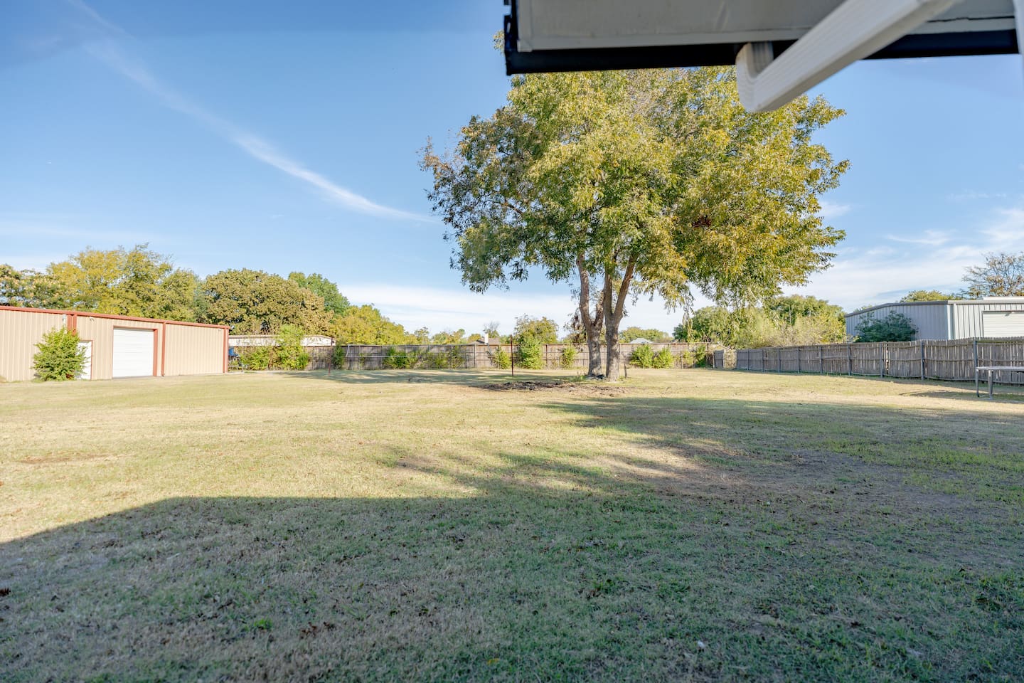 Front view of your Grand Prairie getaway — updated exterior, warm lighting, and a peaceful residential setting close to EpicCentral and AT&T Stadium.