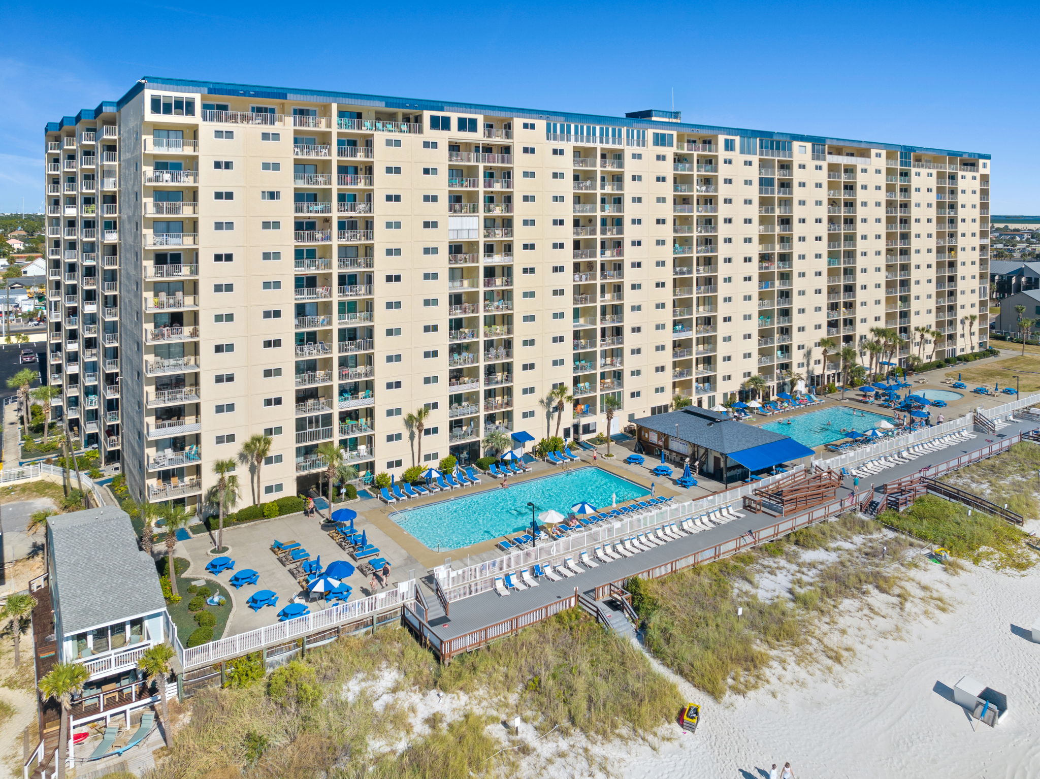 Dive into luxury with not just one, but two large pools to choose from, including one heated year-round for your comfort! ?? Enjoy endless relaxation under the sun while indulging in refreshing cocktails and savory bites without ever having to leave.