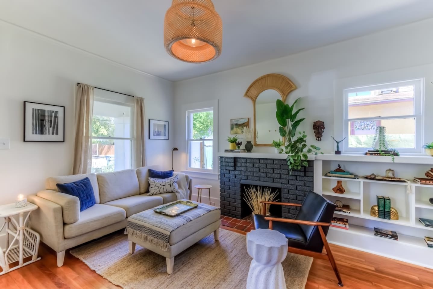 living room with updated decor and wood floors
