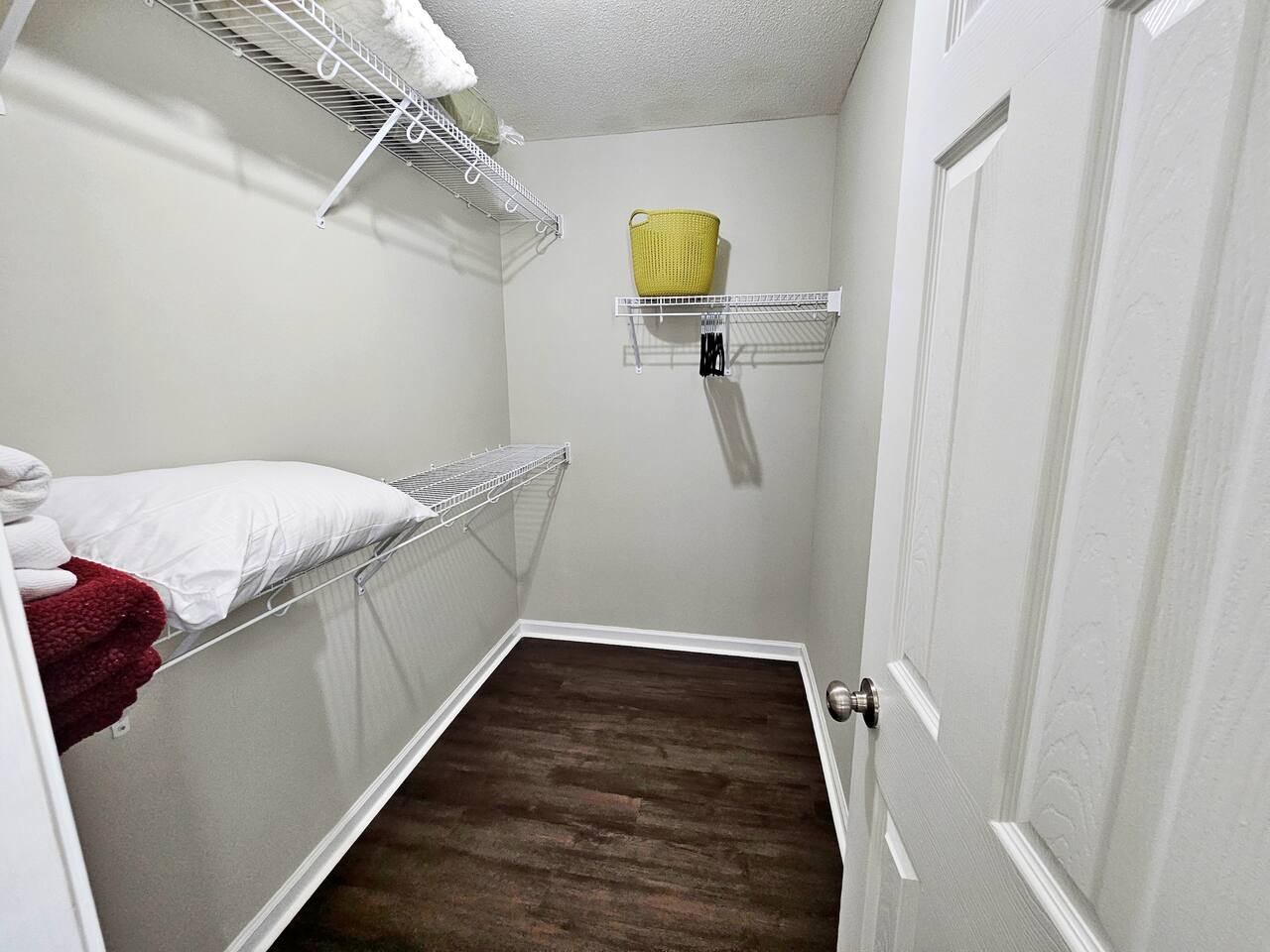 This walk-in closet is located in the main room. There is plenty of space for storage. You will find extra blankets, pillows, and linen here. Velvet hangers included. 
