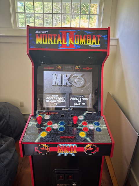 Multicade with 14 games: Mortal Kombat, Mortal Kombat 2 & 3, Ultimate Mortal Kombat, Toobin, Rampage, Joust, Rootbeer Tapper, Defender, Paperboy, Gauntlet, Wizard of War, Bobbles and Klax