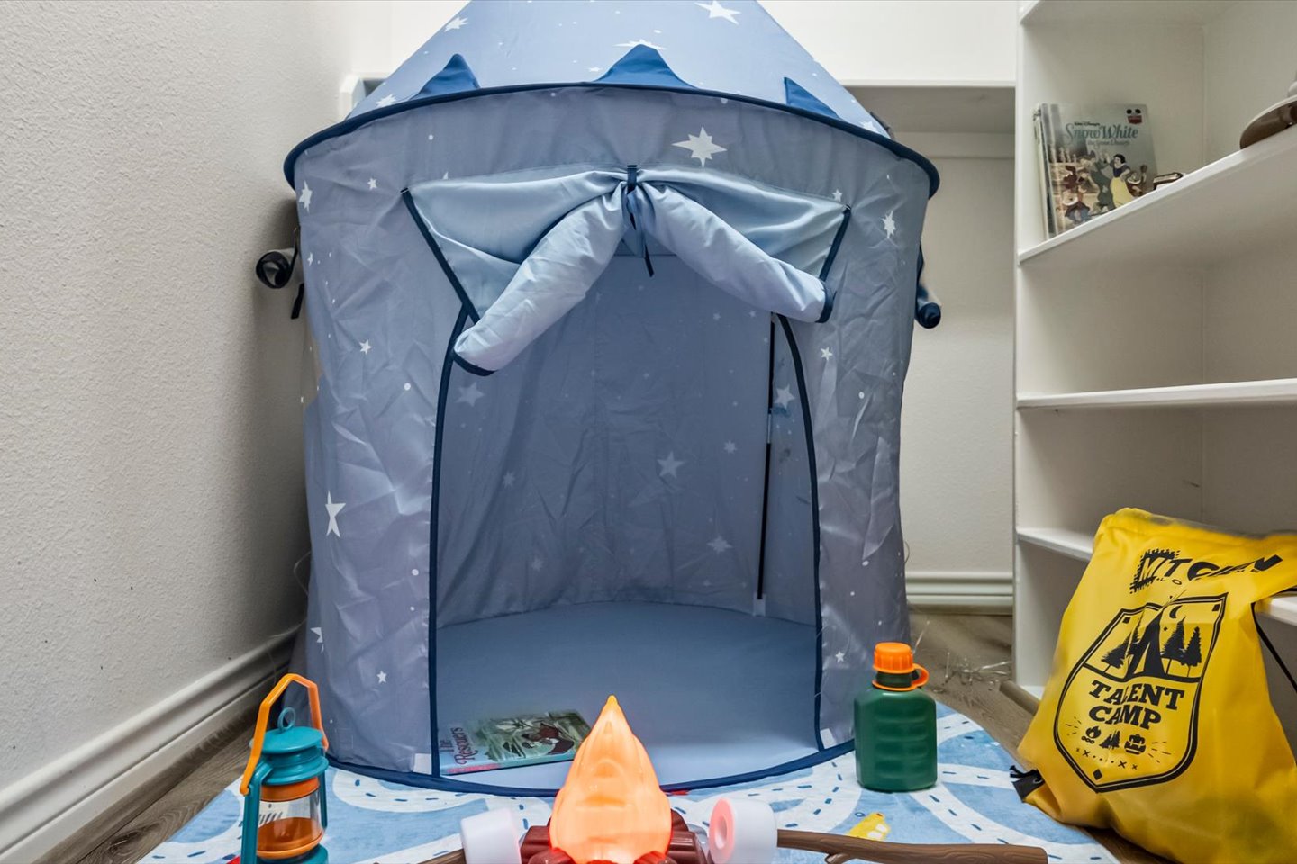 A hide away fort for the kids!  Toys, books and games to spark the imagination. 