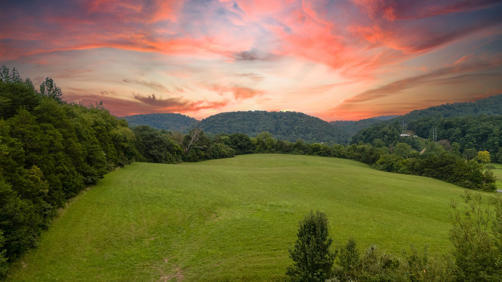 Beautiful view of the meadow and mountains from the king bedroom upstairs.