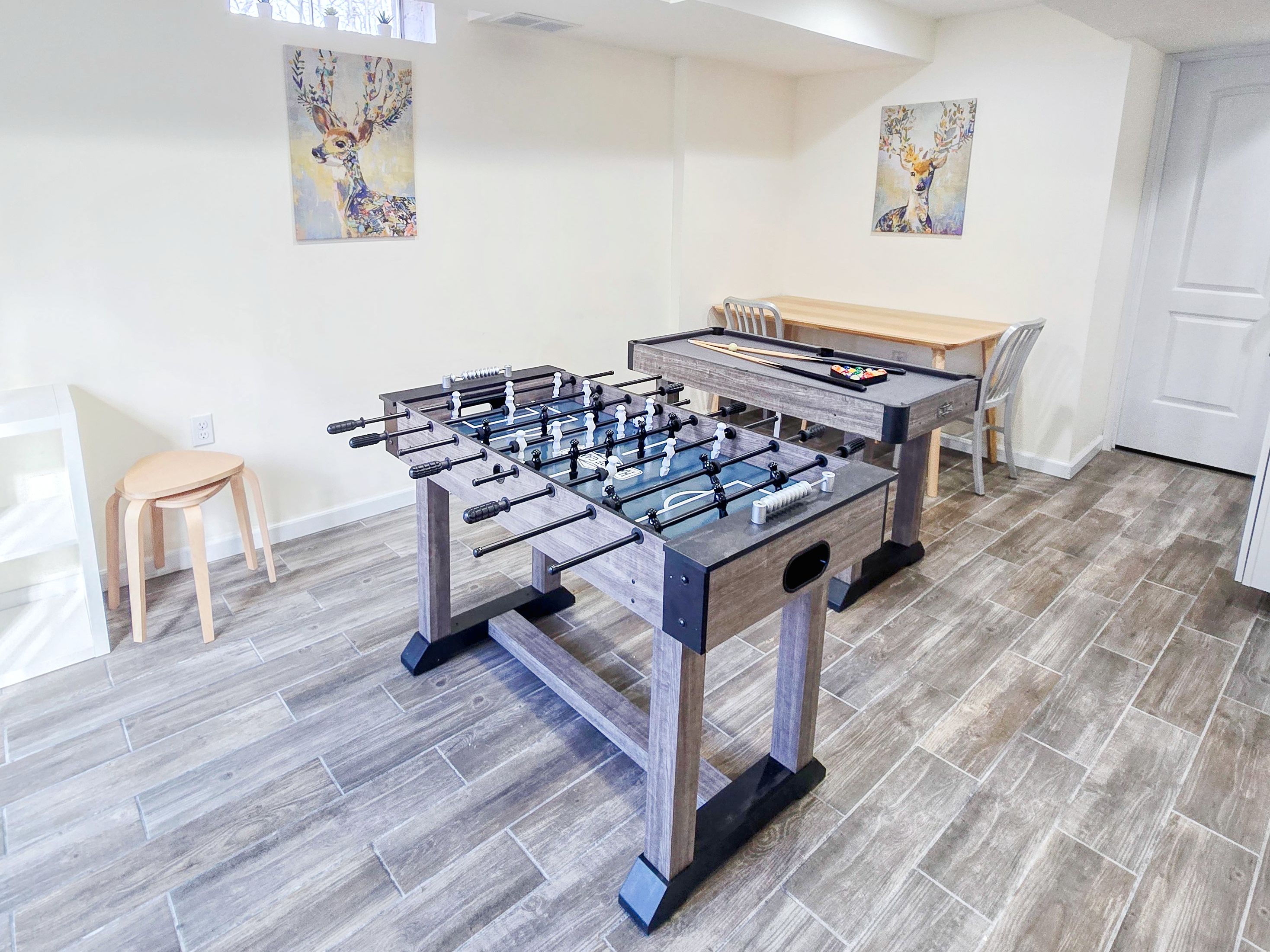 Lower level with Smart TV, PlayStation 5, foosball, mini pool table