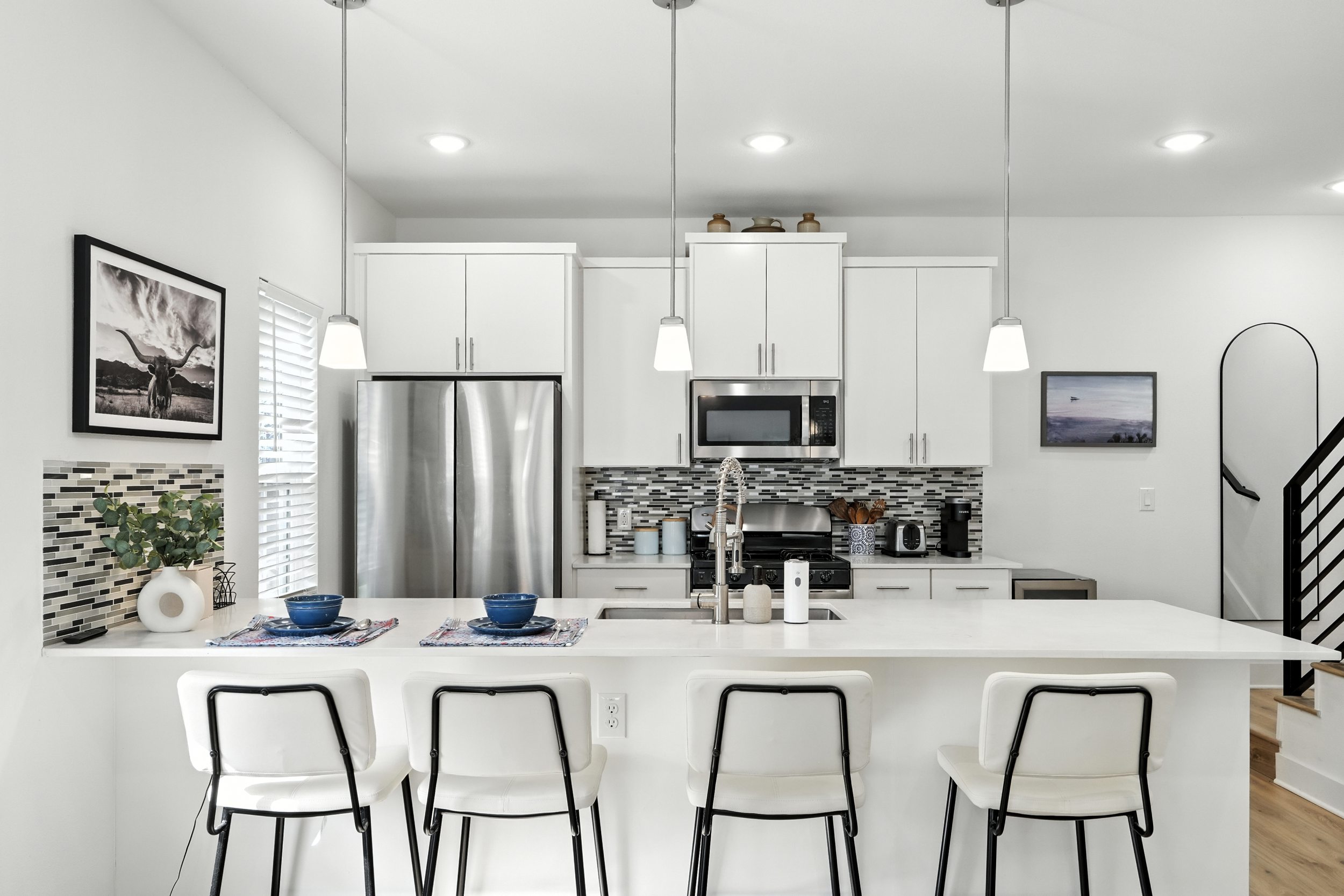 gourmet kitchen with lux appliances and fully stocked