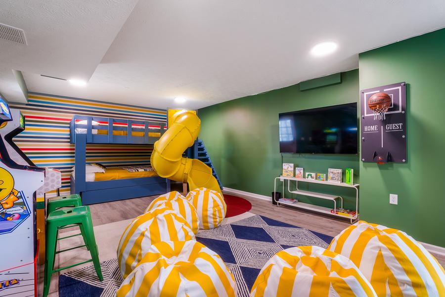Kids bunk room with yellow slide