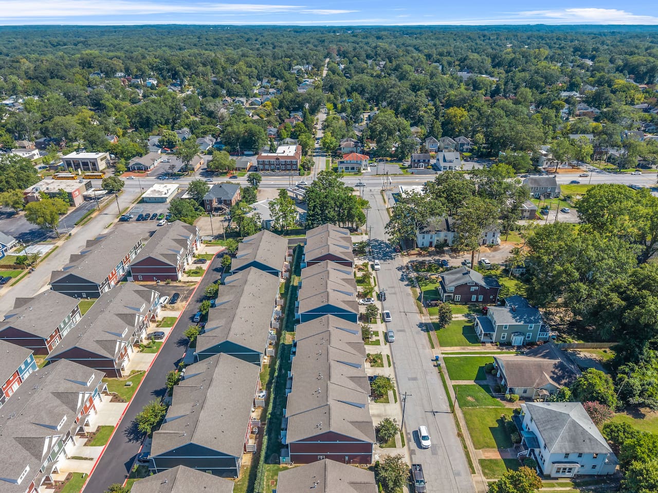 A stunning bird’s-eye perspective showcasing the modern townhome community.