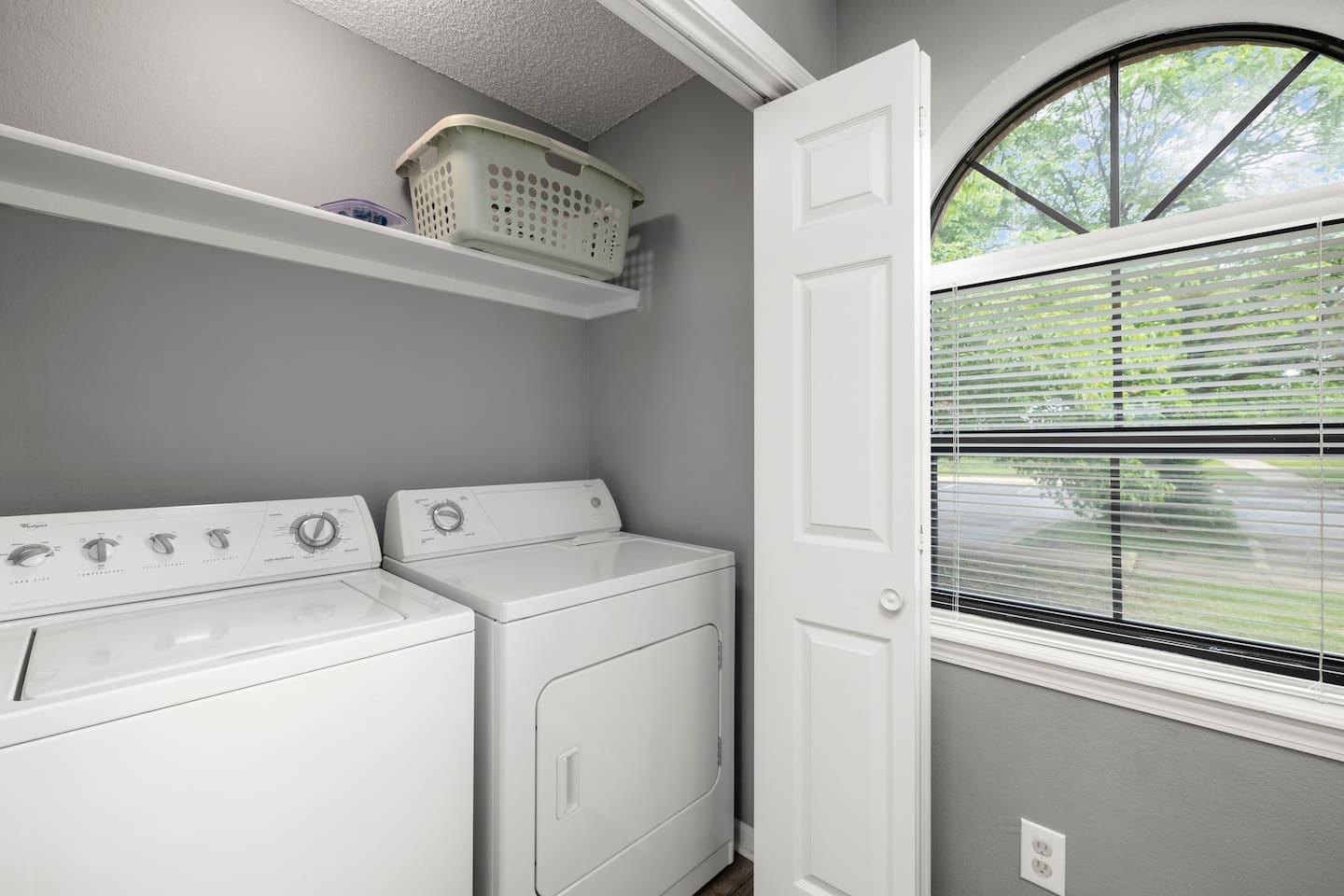 Laundry Room: Efficient appliances and bright natural light for convenience while you unwind!