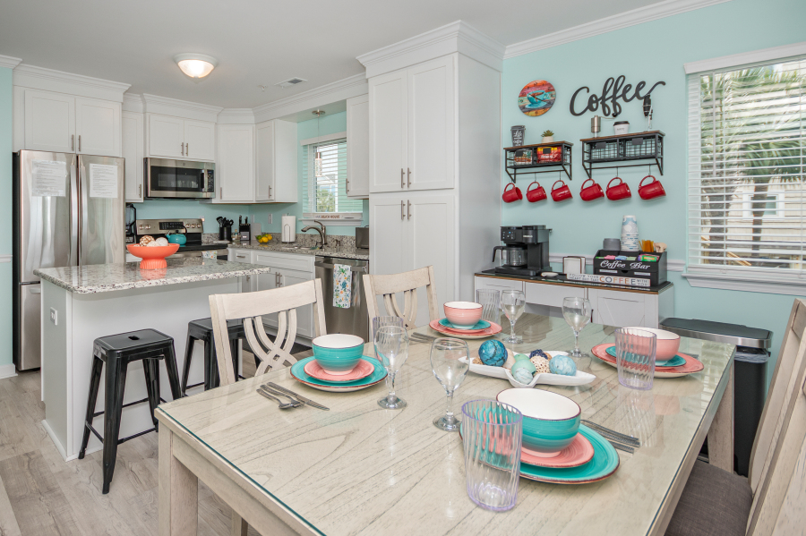 Dining area plus bar stools and coffee bar!
