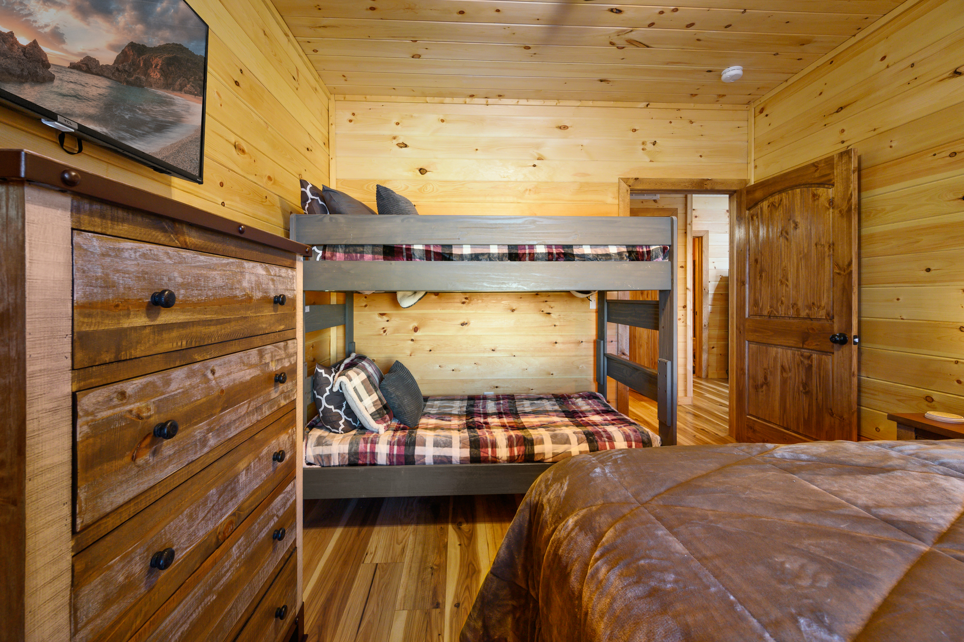 Cypress Downstairs queen bedroom with twin bunks