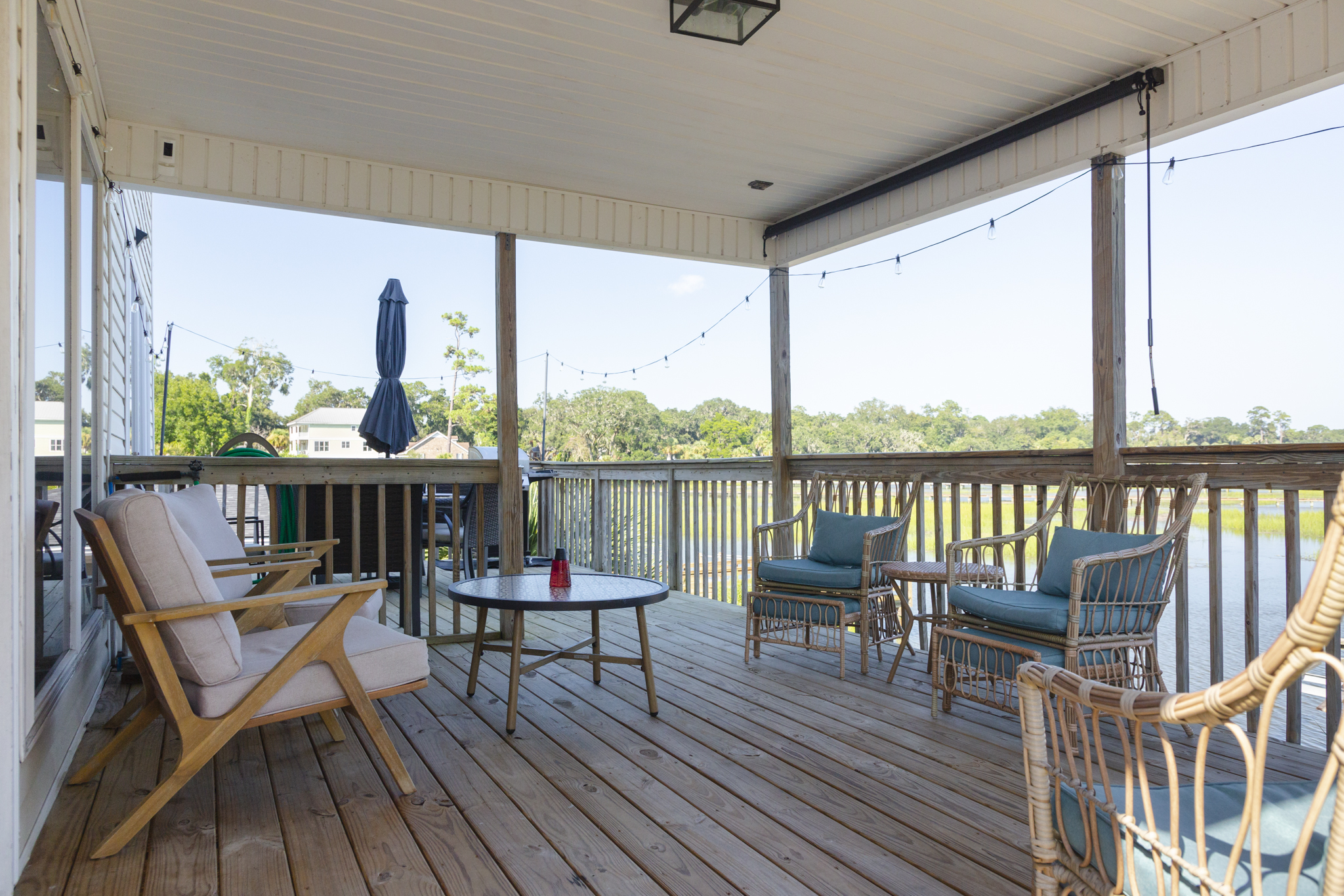Relax on the upper deck with comfortable seating and peaceful water views.