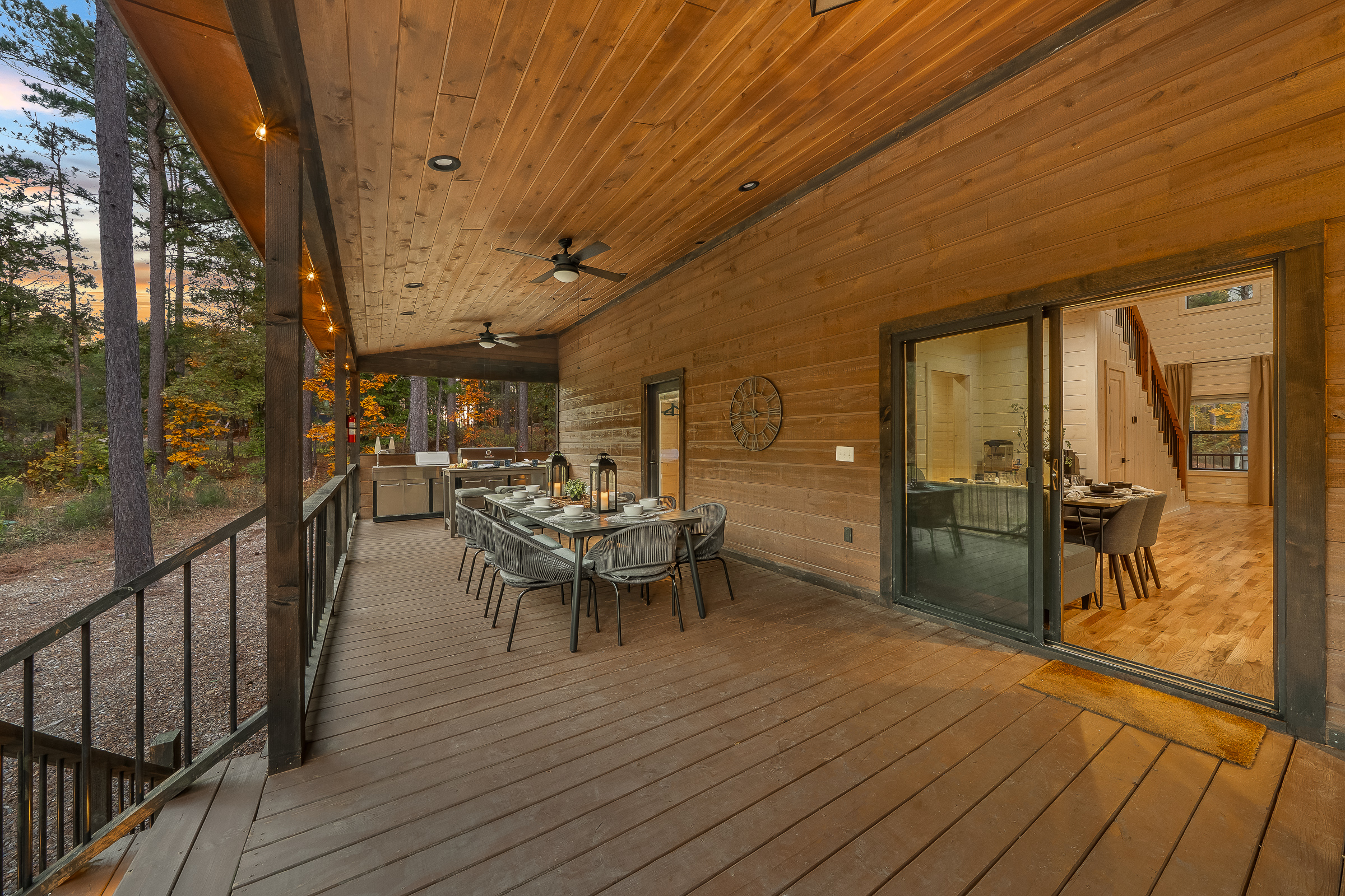 Entertainers deck thoughtfully arranged with bar, dining, and lounge zones so everyone has a perfect place to gather.