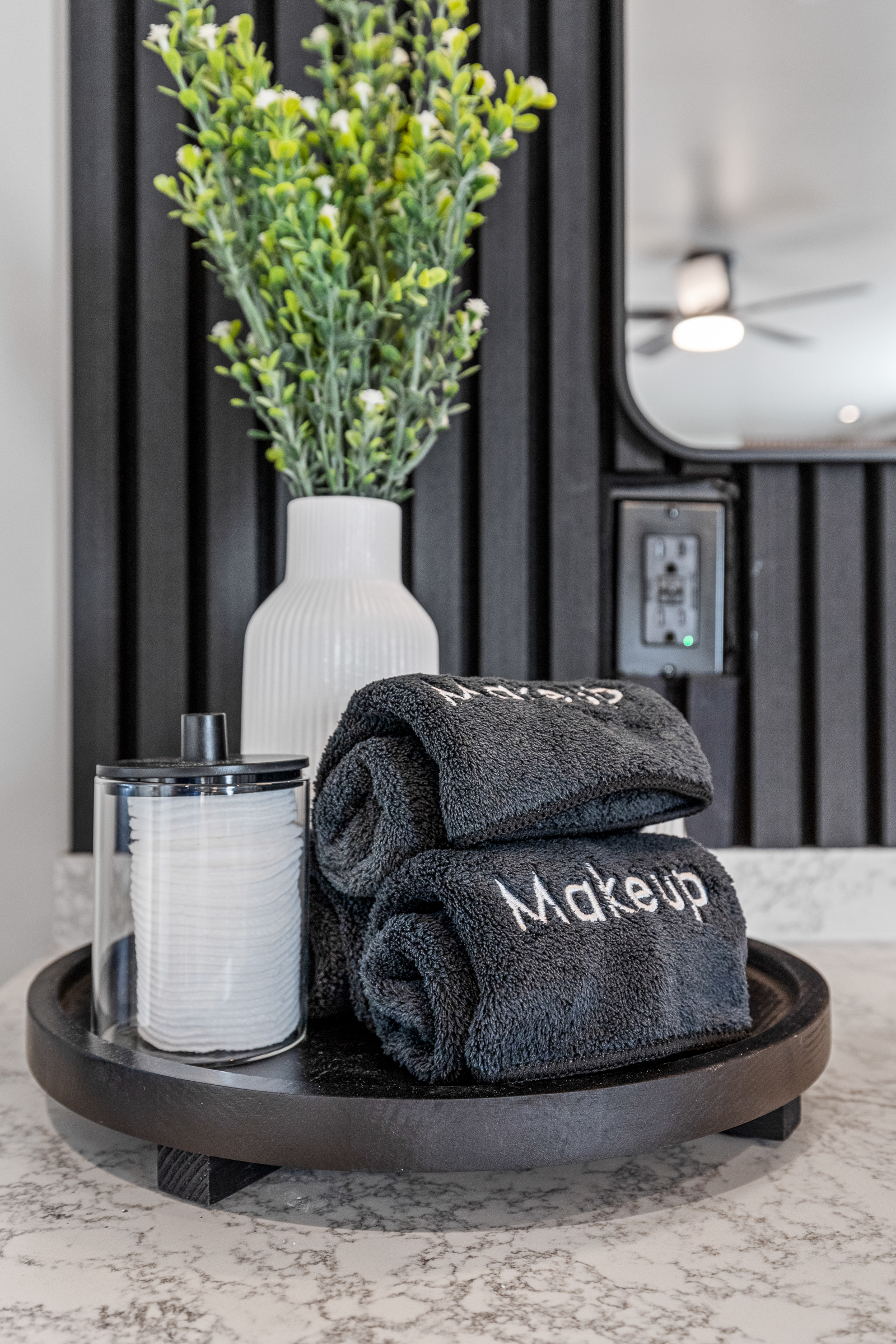 Guesthouse bathroom details featuring plush towels and curated décor touches.