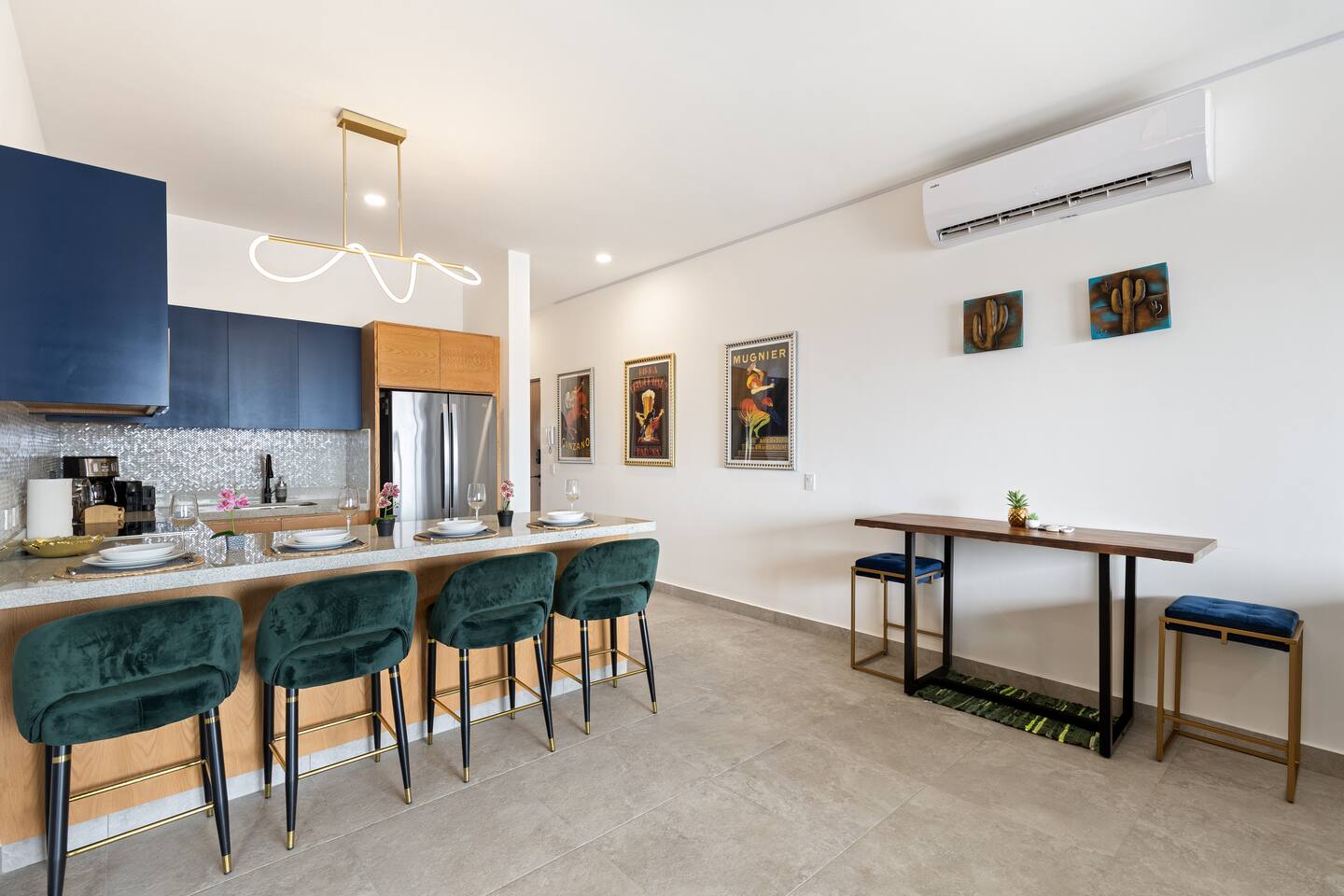 Imagine yourself relaxing and chatting at the counter, savoring a sip or bite in this cozy Cabo setting.